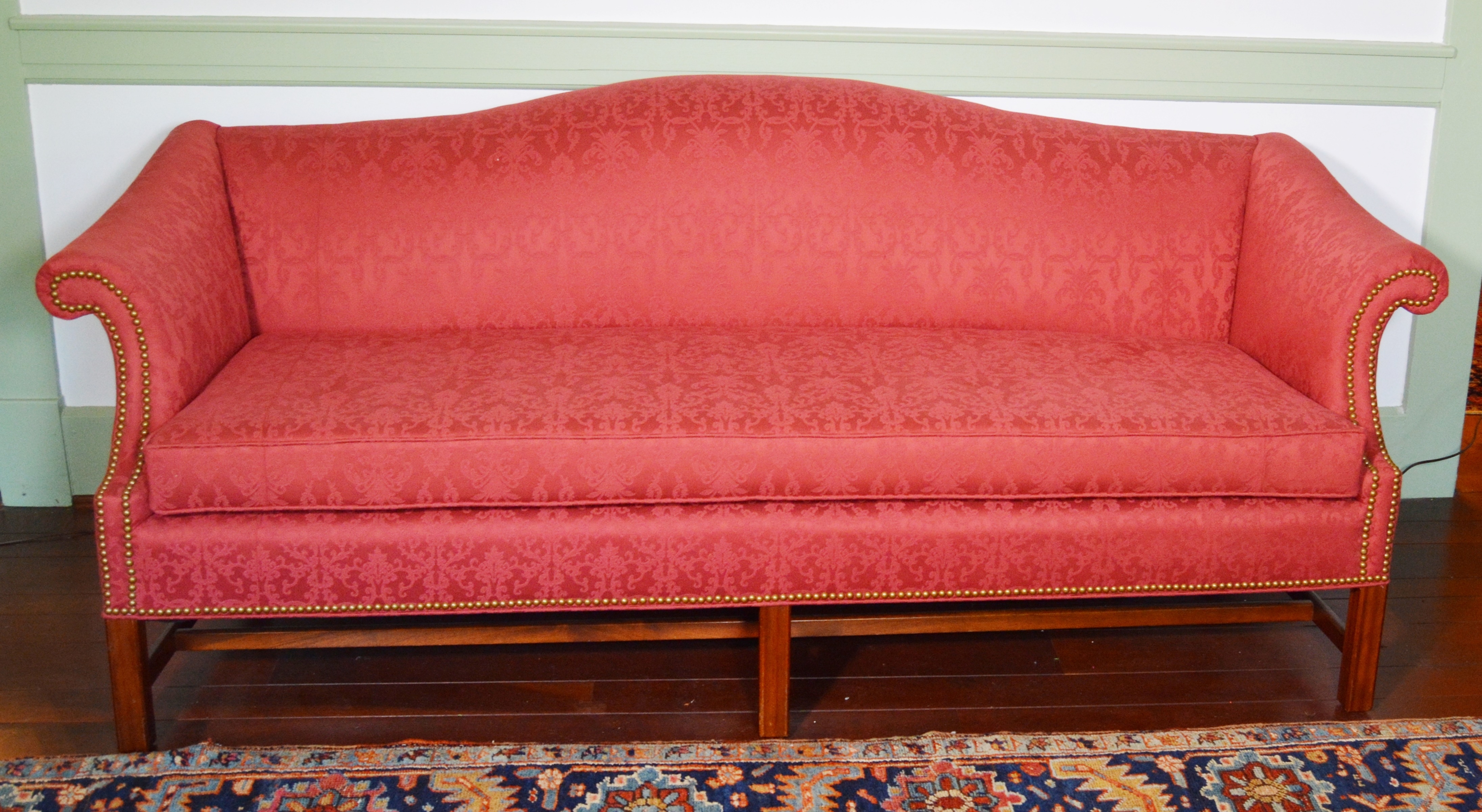 Vintage Upholstered Camelback Sofa