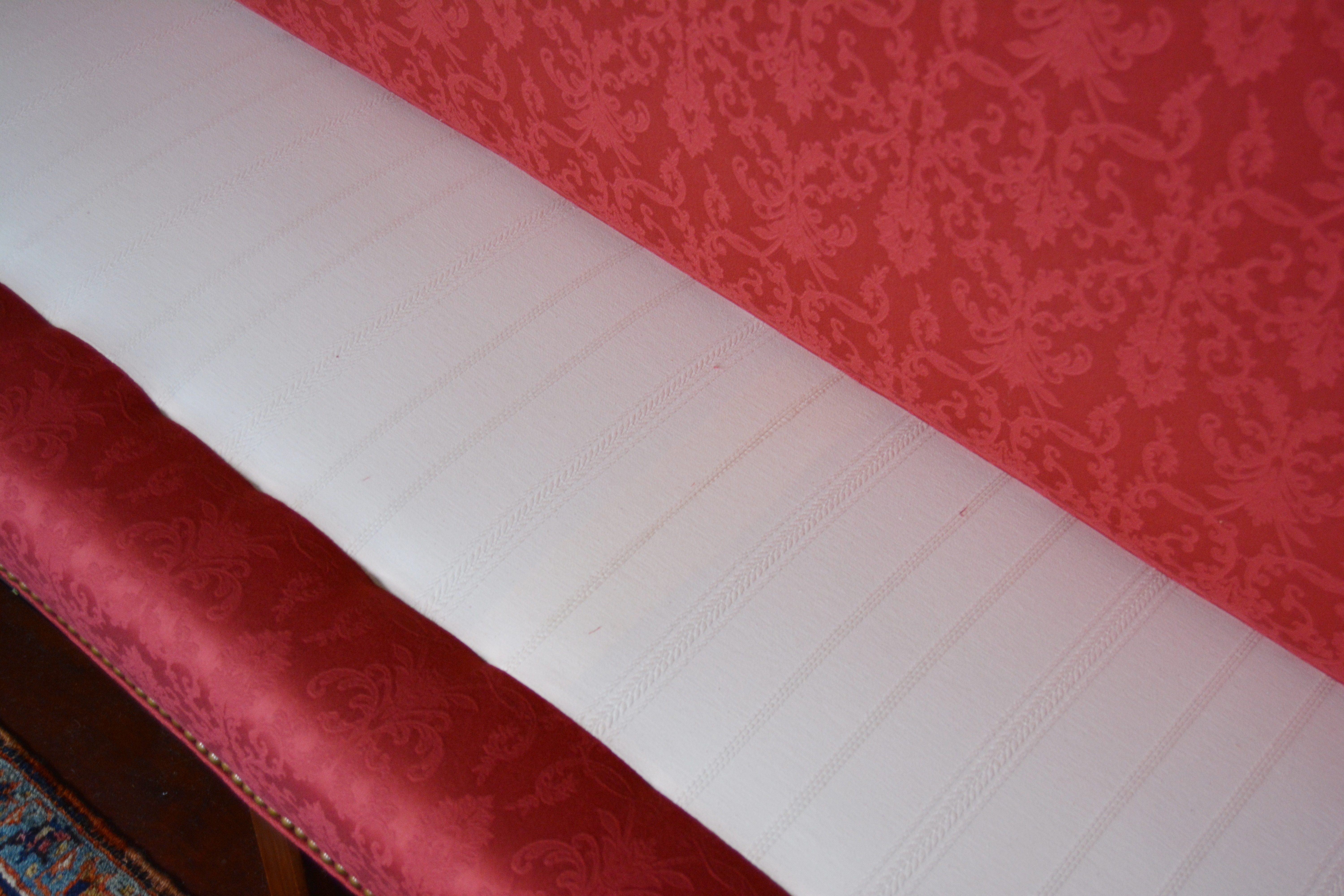 Vintage Upholstered Camelback Sofa