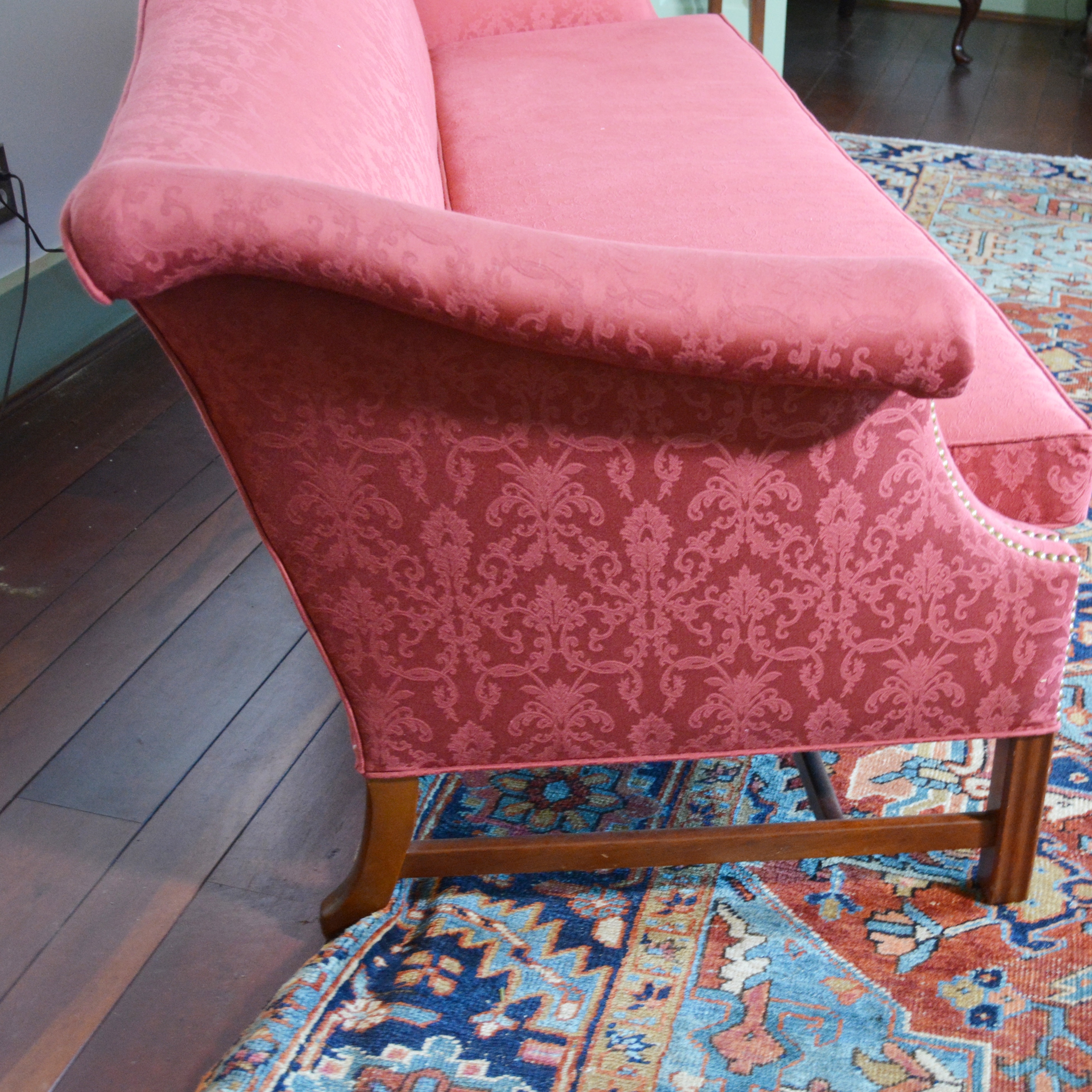 Vintage Upholstered Camelback Sofa