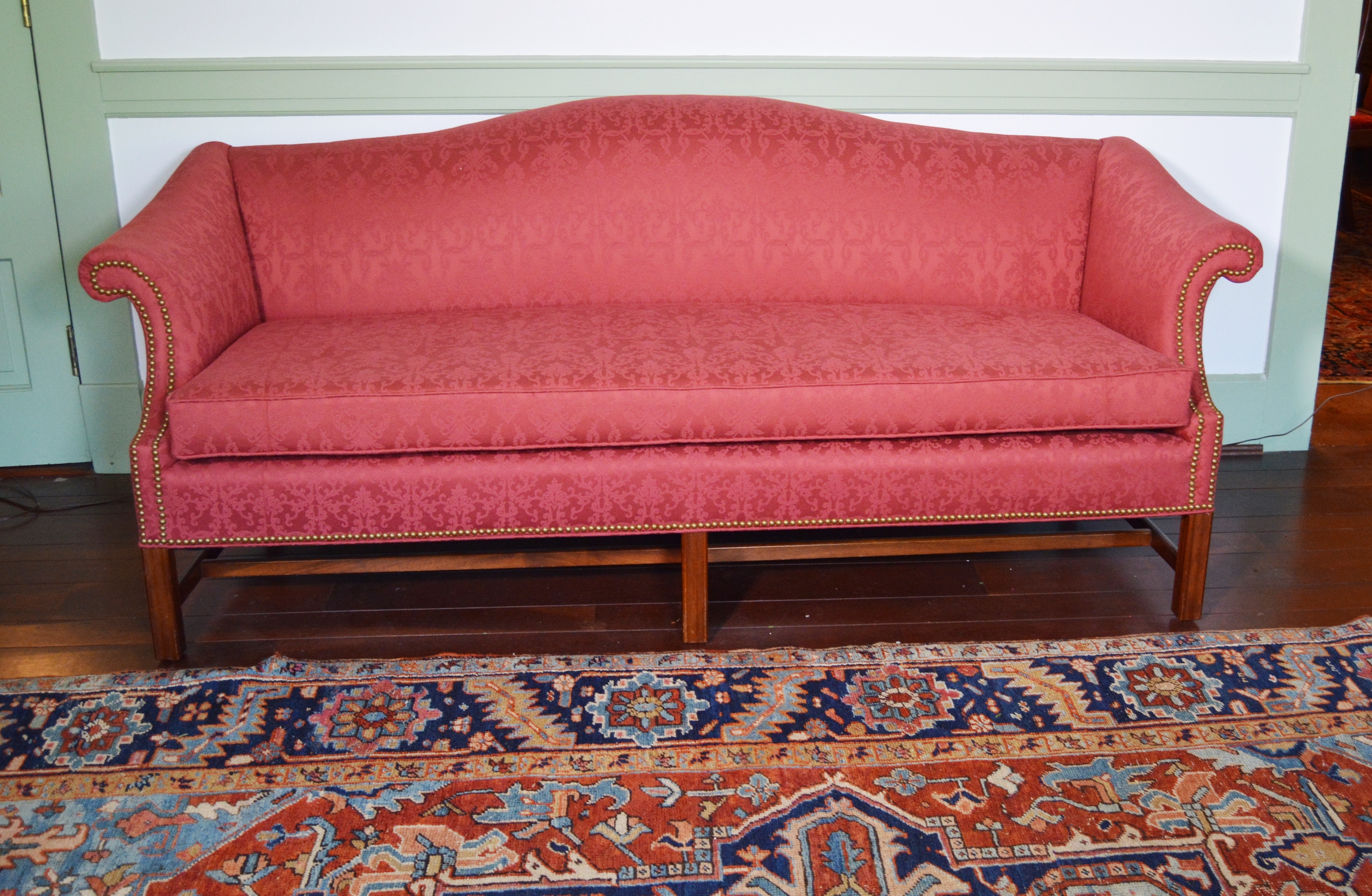 Vintage Upholstered Camelback Sofa