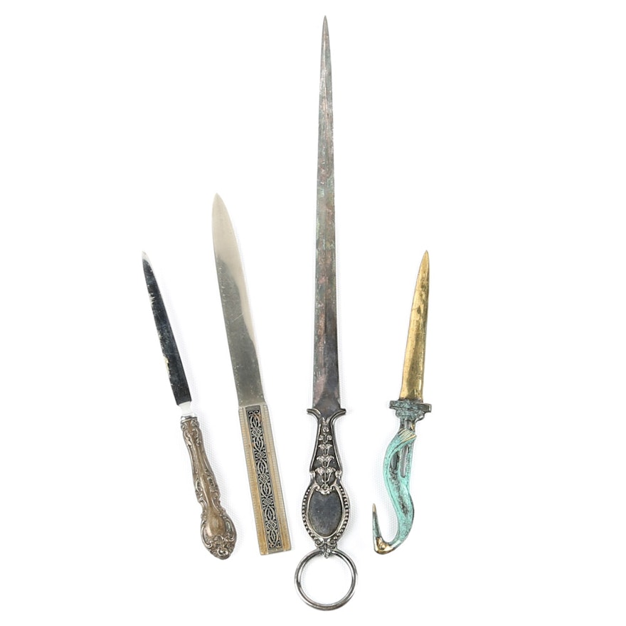 Collection of Four Letter Openers