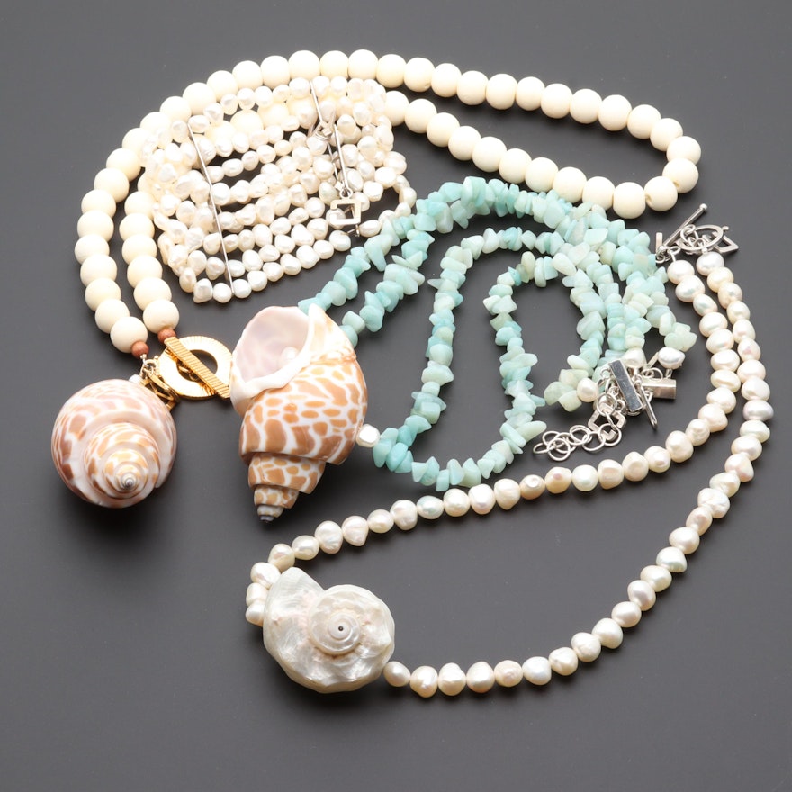 Jewelry Assortment Including Shell, Cultured Pearl, and Nut