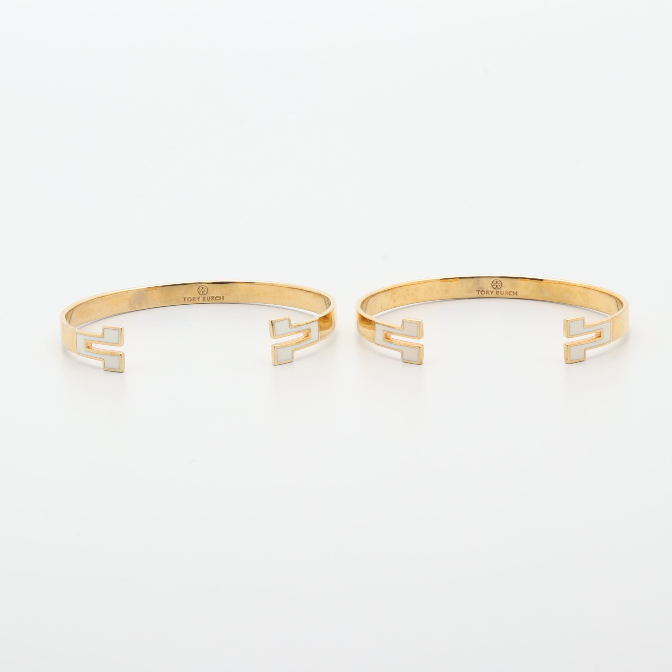 Gold Tone Necklace and Bracelets Featuring Tory Burch and Diane Von Furstenburg