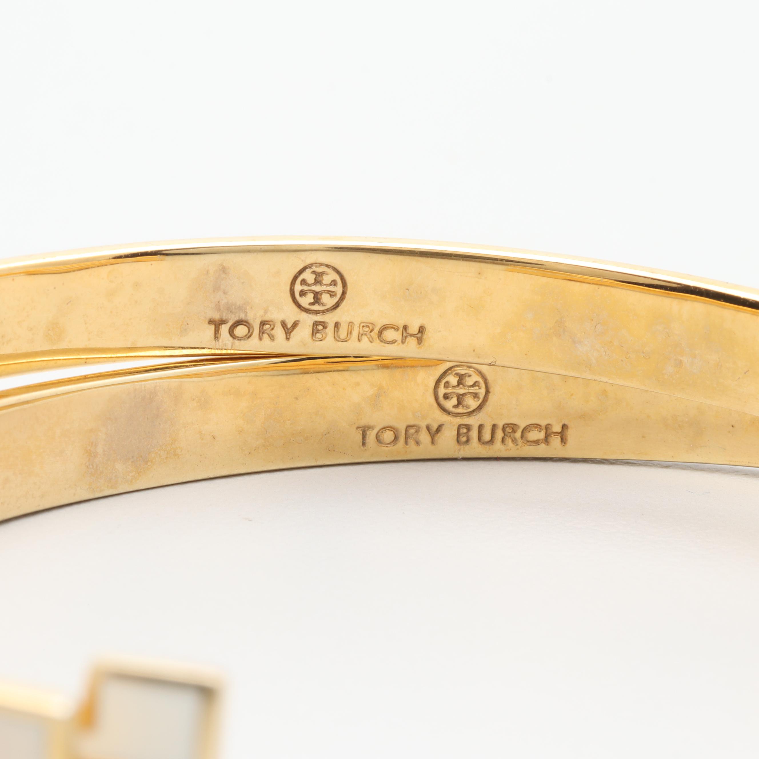 Gold Tone Necklace and Bracelets Featuring Tory Burch and Diane Von Furstenburg