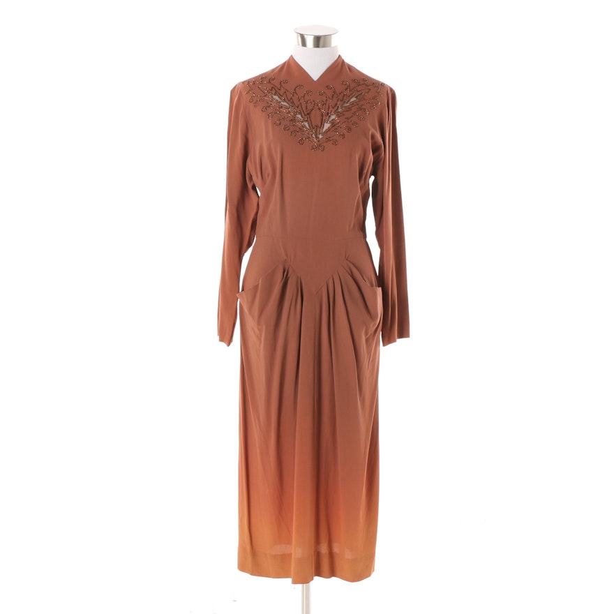 Circa 1940s Long Sleeved Cocktail Dress featuring Beaded Bodice and Basque Waist