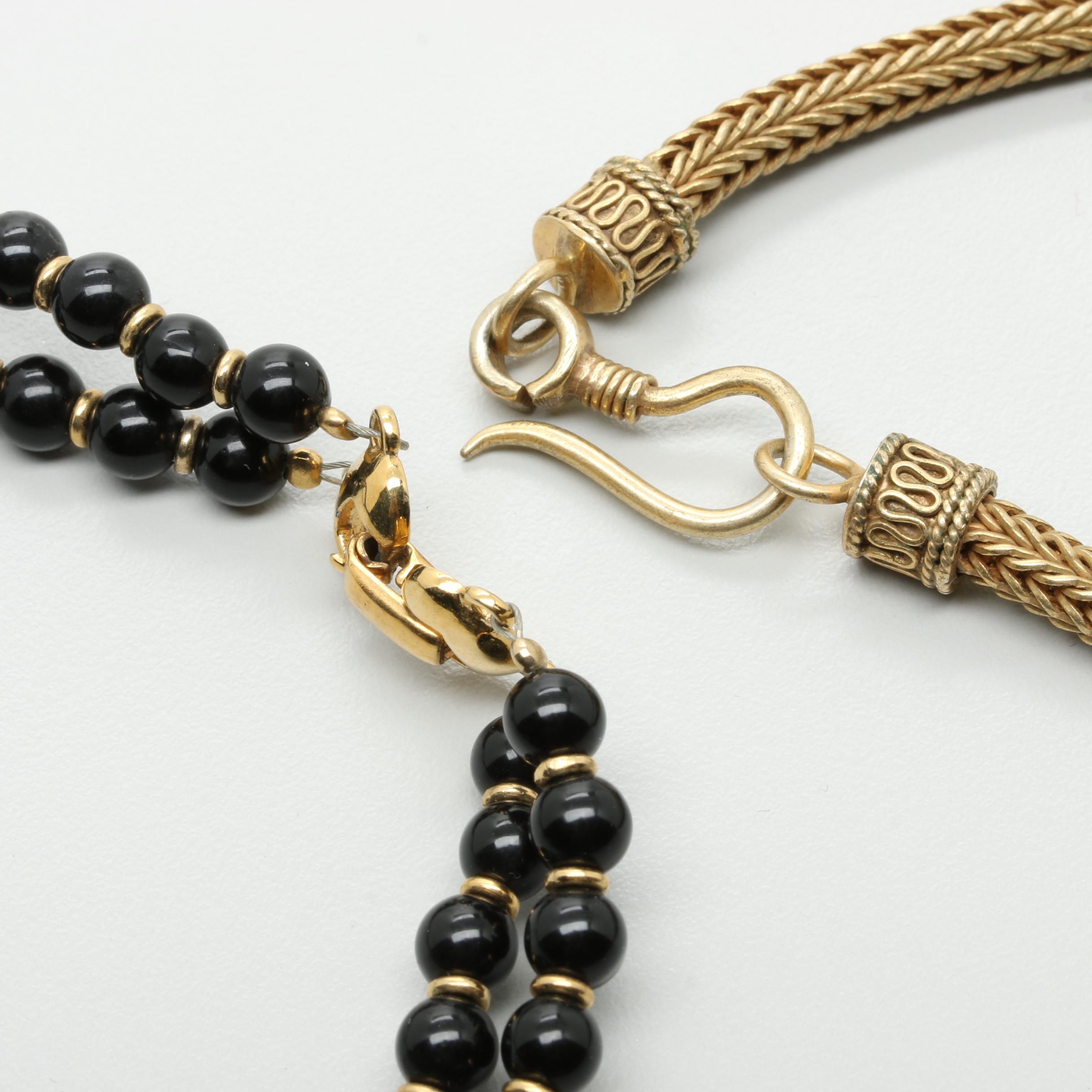 Assortment of Jewelry Including Joan Rivers, Laurel Burch, and Enamel