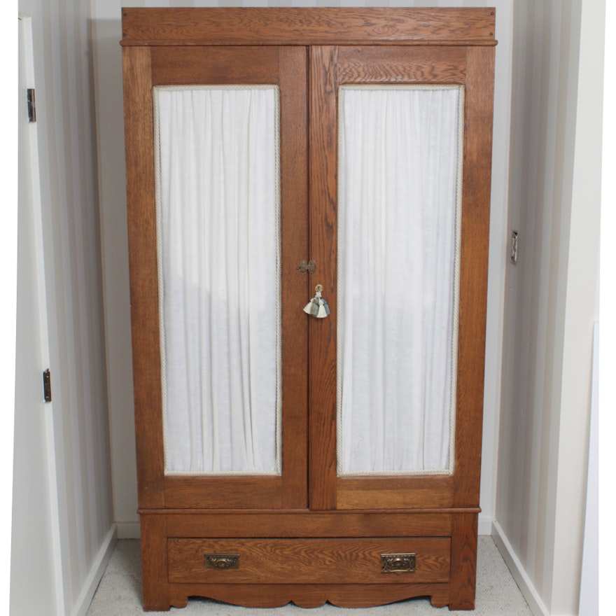 An Early 20th Century American Oak Armoire