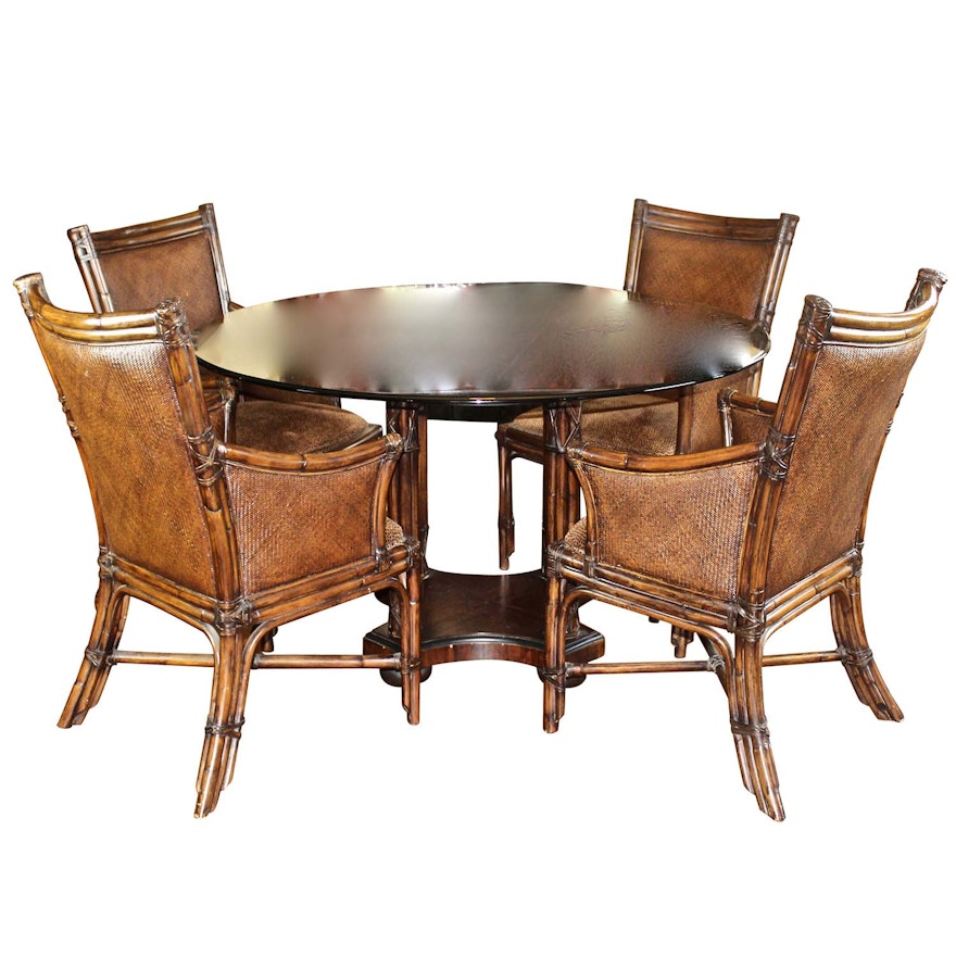 Round Glass Dining Table with Four Woven Chairs