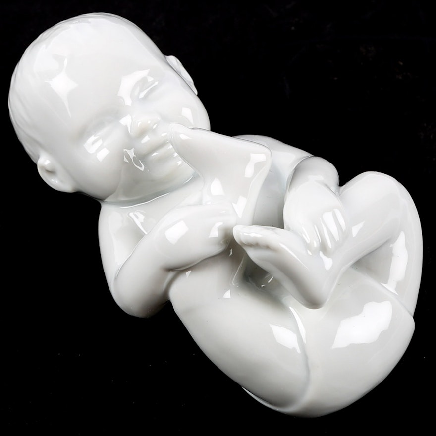 Royal Copenhagen "Babbling Baby" Porcelain Figurine