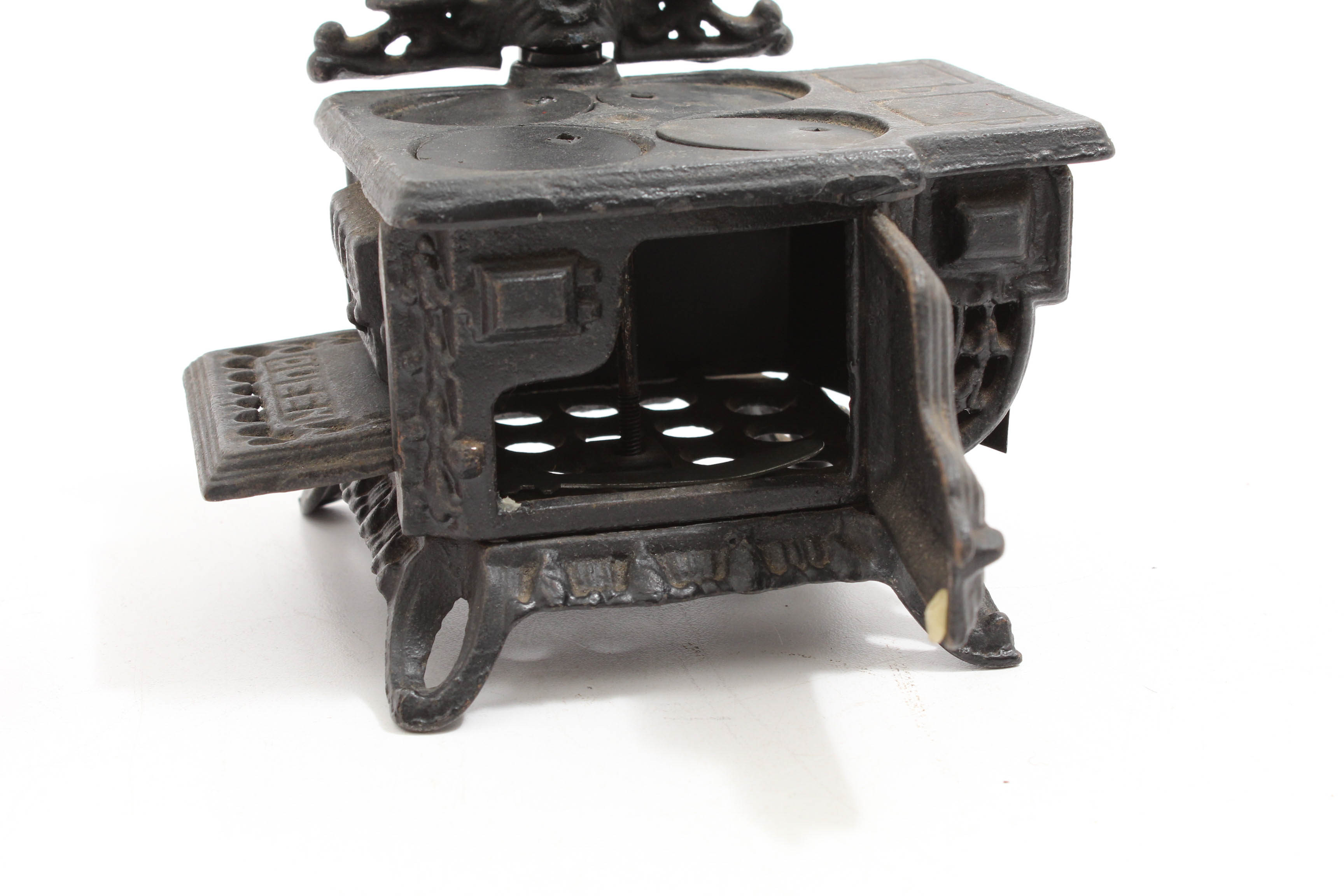 Vintage Cast Iron Toy Stove and Figurines