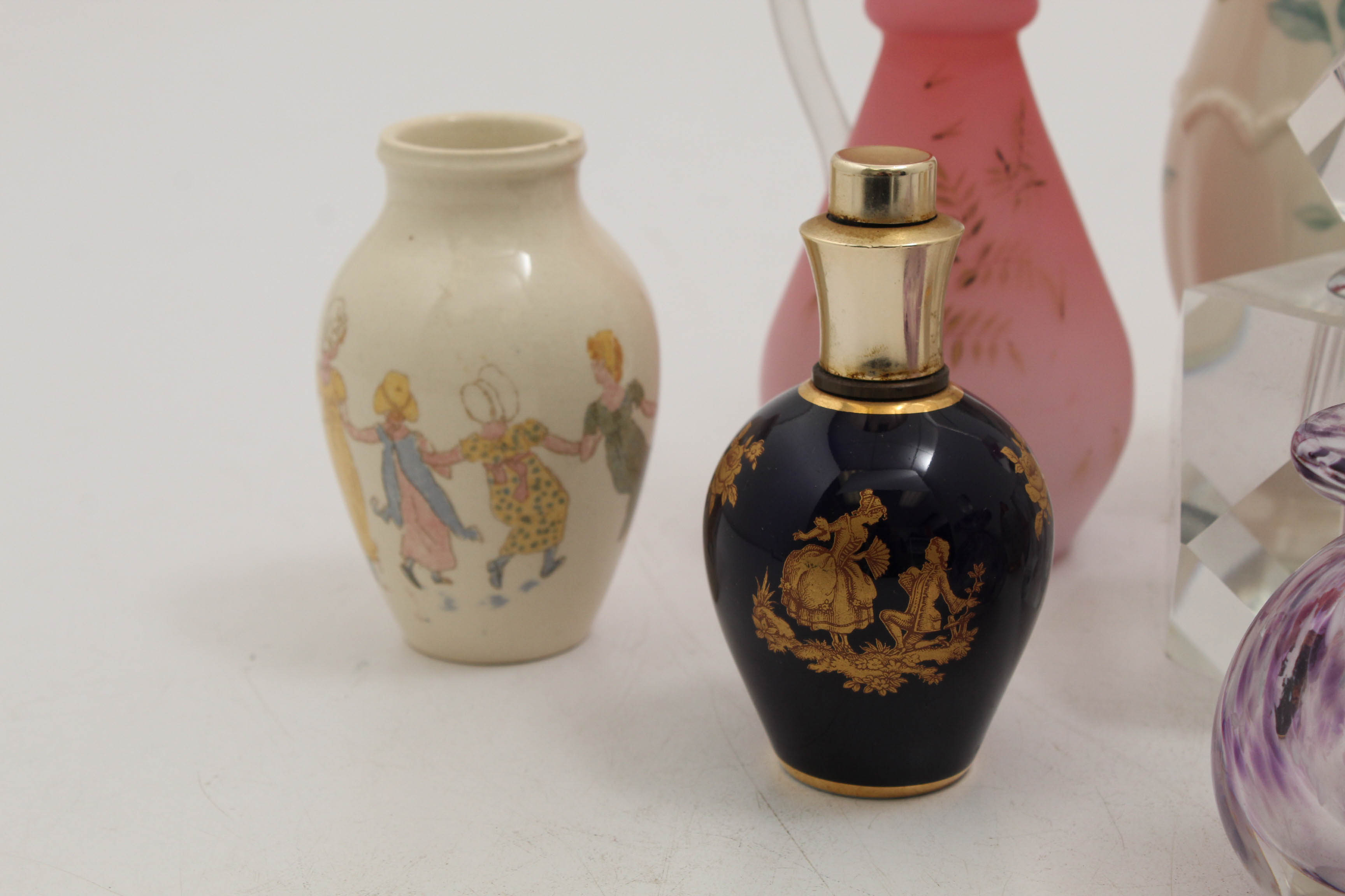 Perfume Bottle Featuring Limoges and Vases