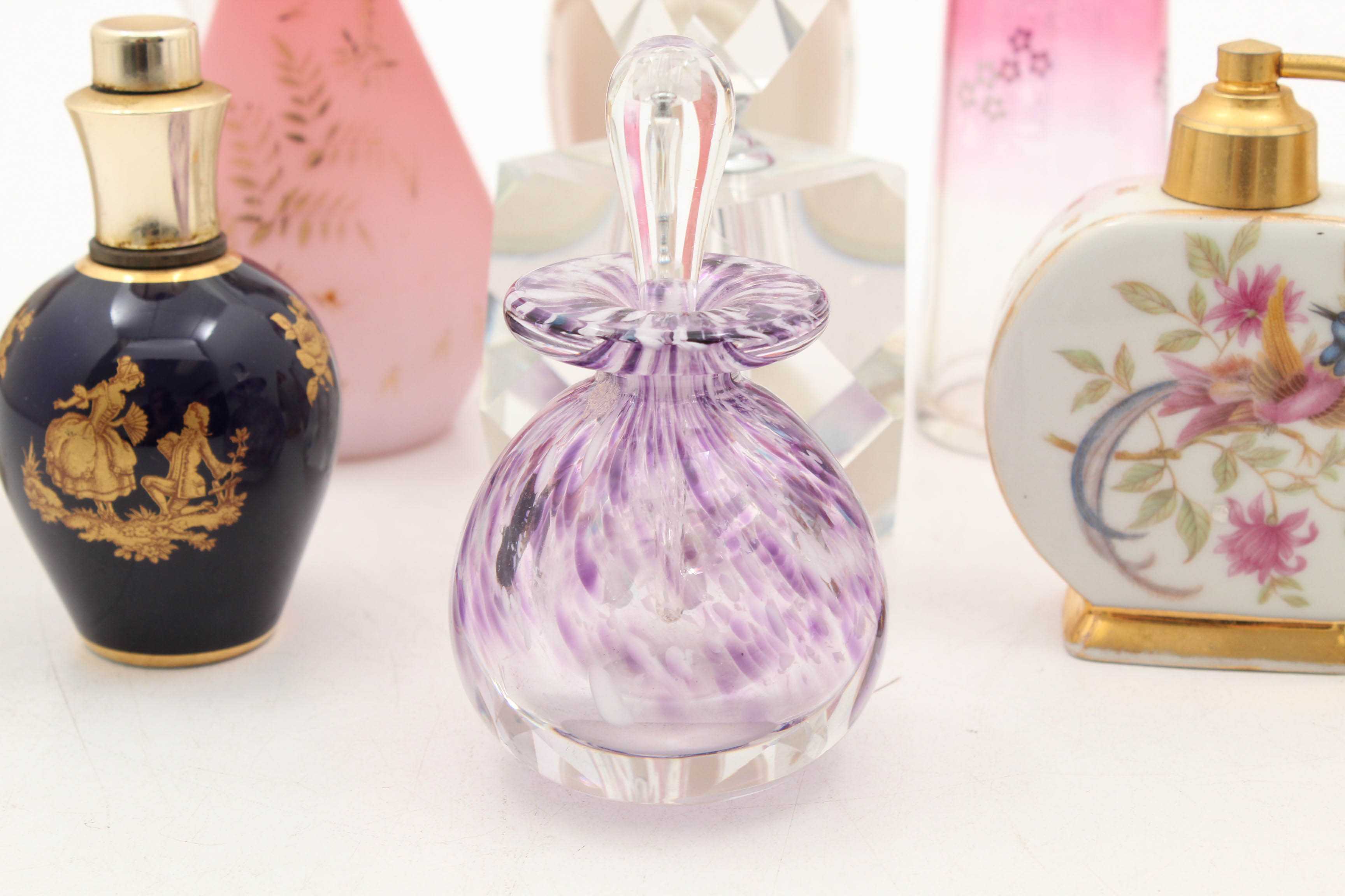Perfume Bottle Featuring Limoges and Vases