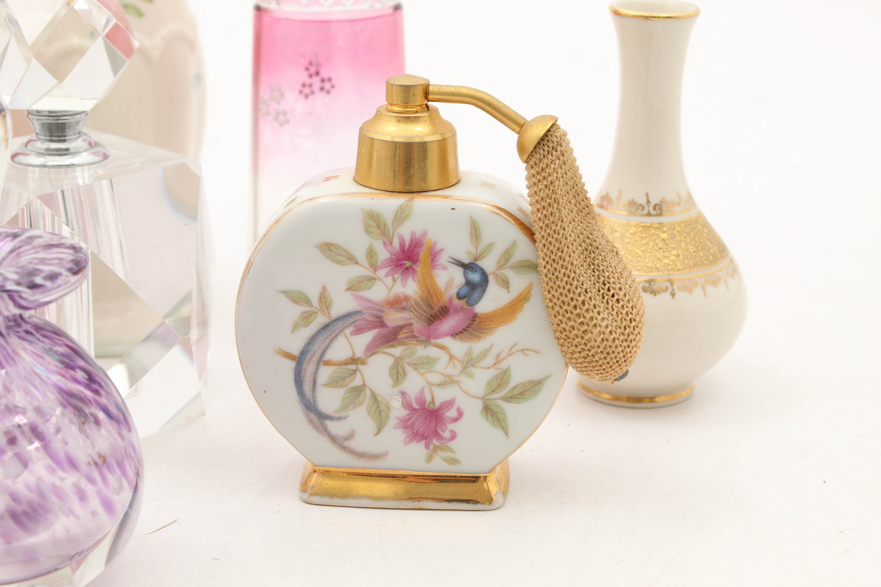 Perfume Bottle Featuring Limoges and Vases