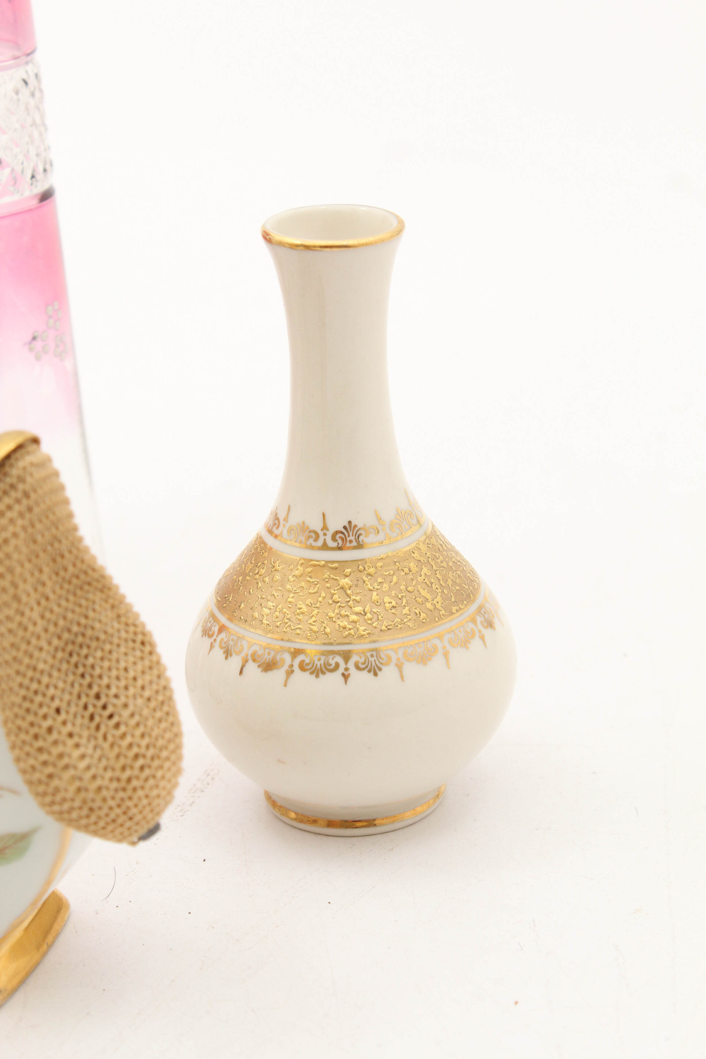 Perfume Bottle Featuring Limoges and Vases