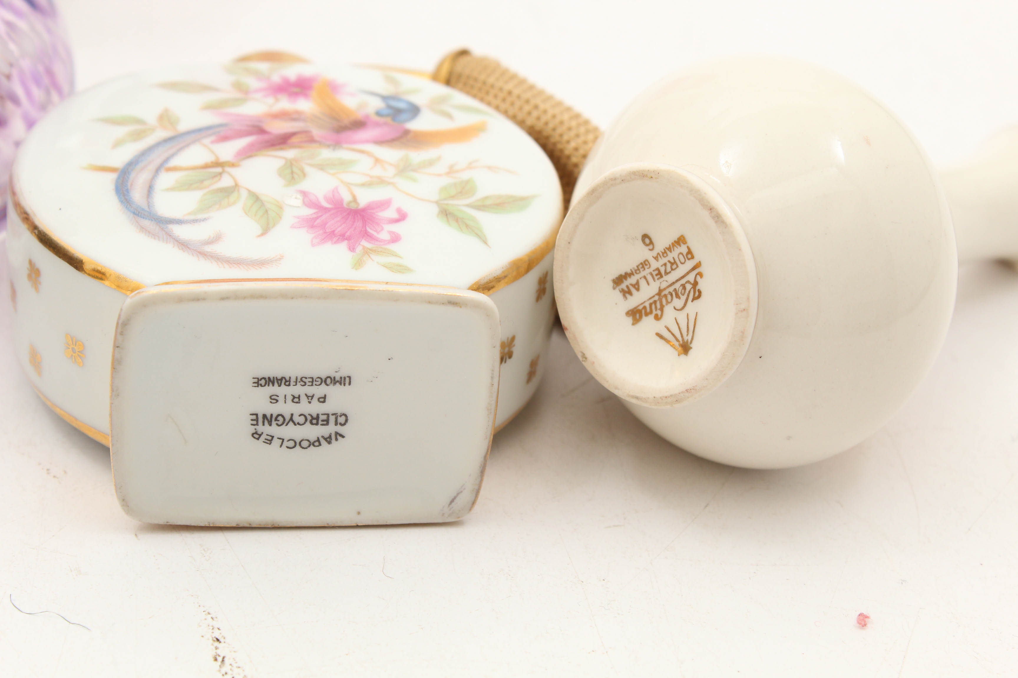 Perfume Bottle Featuring Limoges and Vases