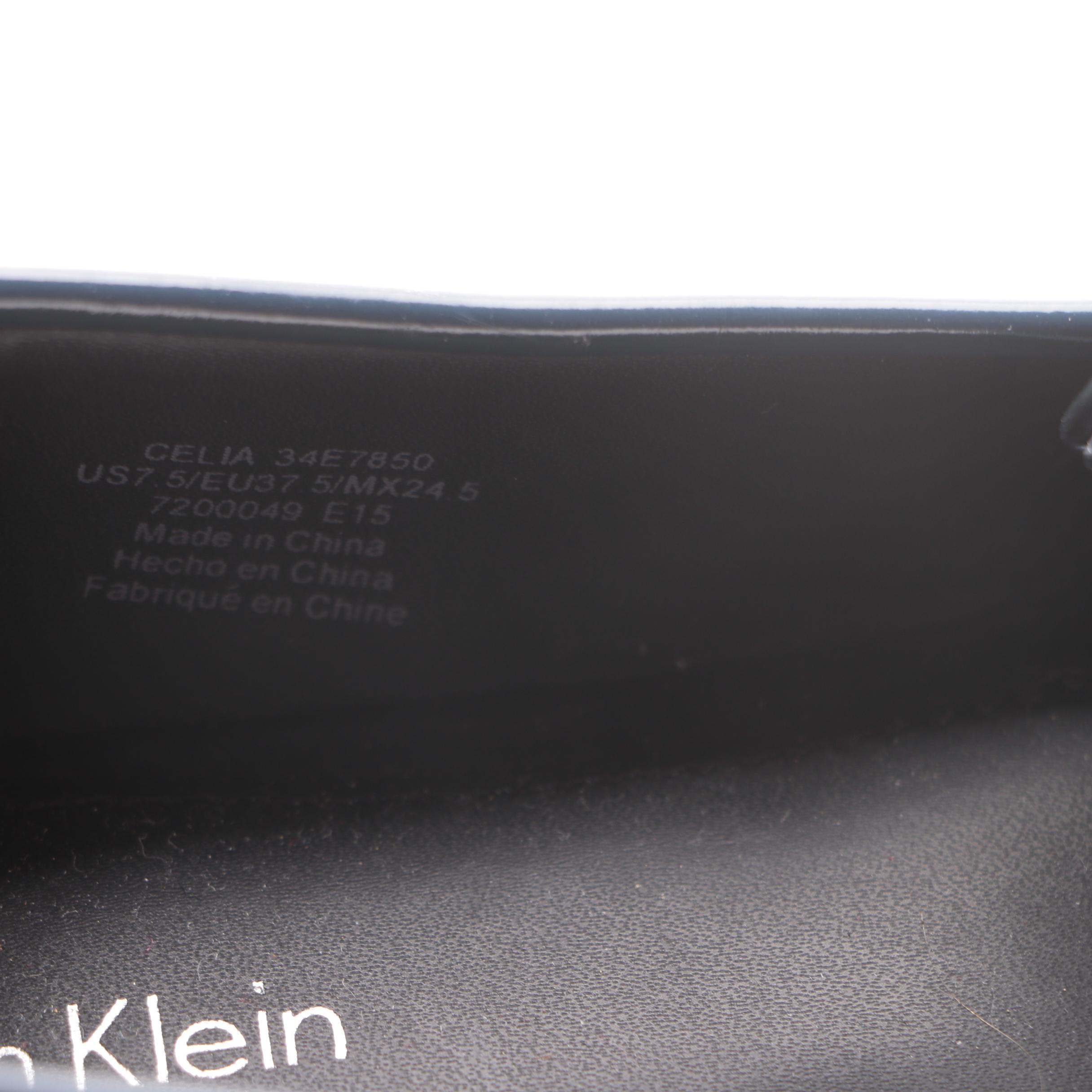 Women's Calvin Klein, Tahari, Toms and Tory Burch Flats