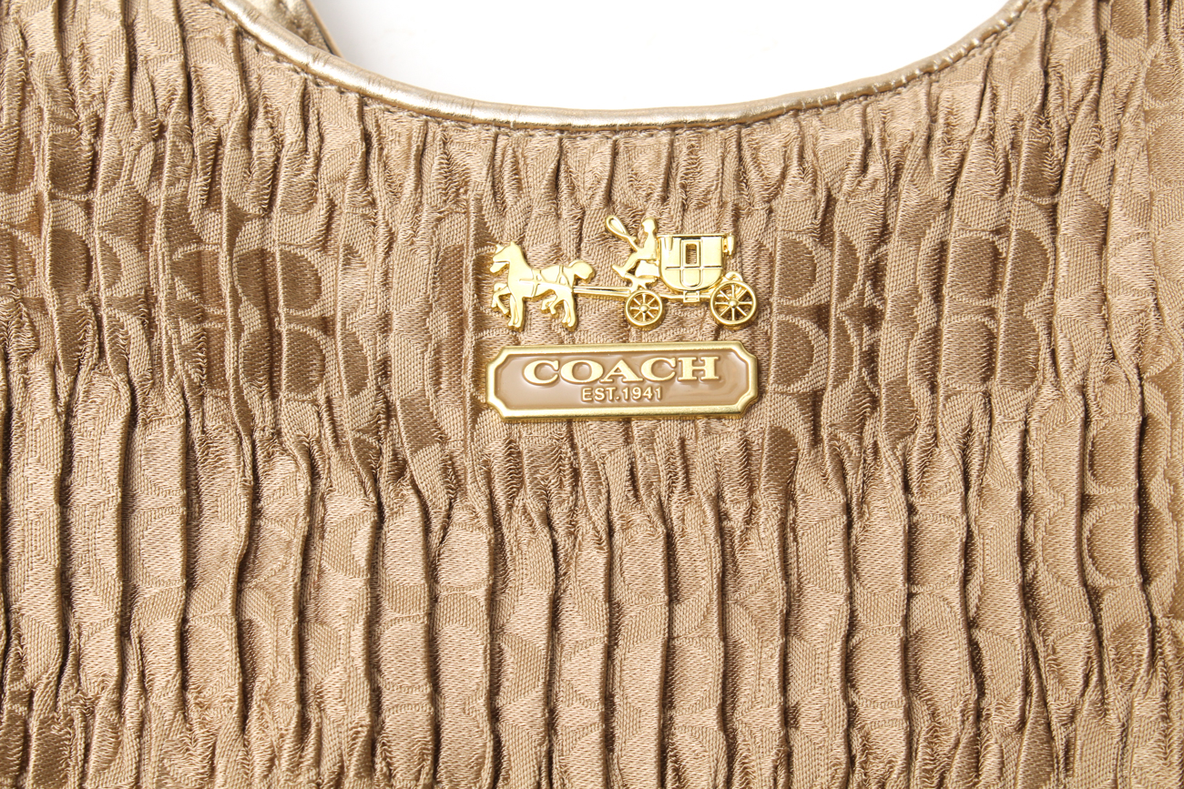 Coach Maggie Madison Signature Shoulder Bag and a Coach Metallic Duffle Bag