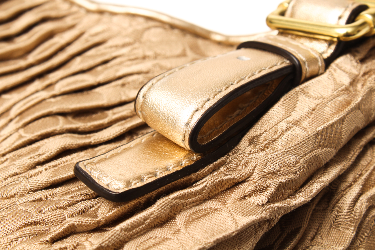 Coach Maggie Madison Signature Shoulder Bag and a Coach Metallic Duffle Bag