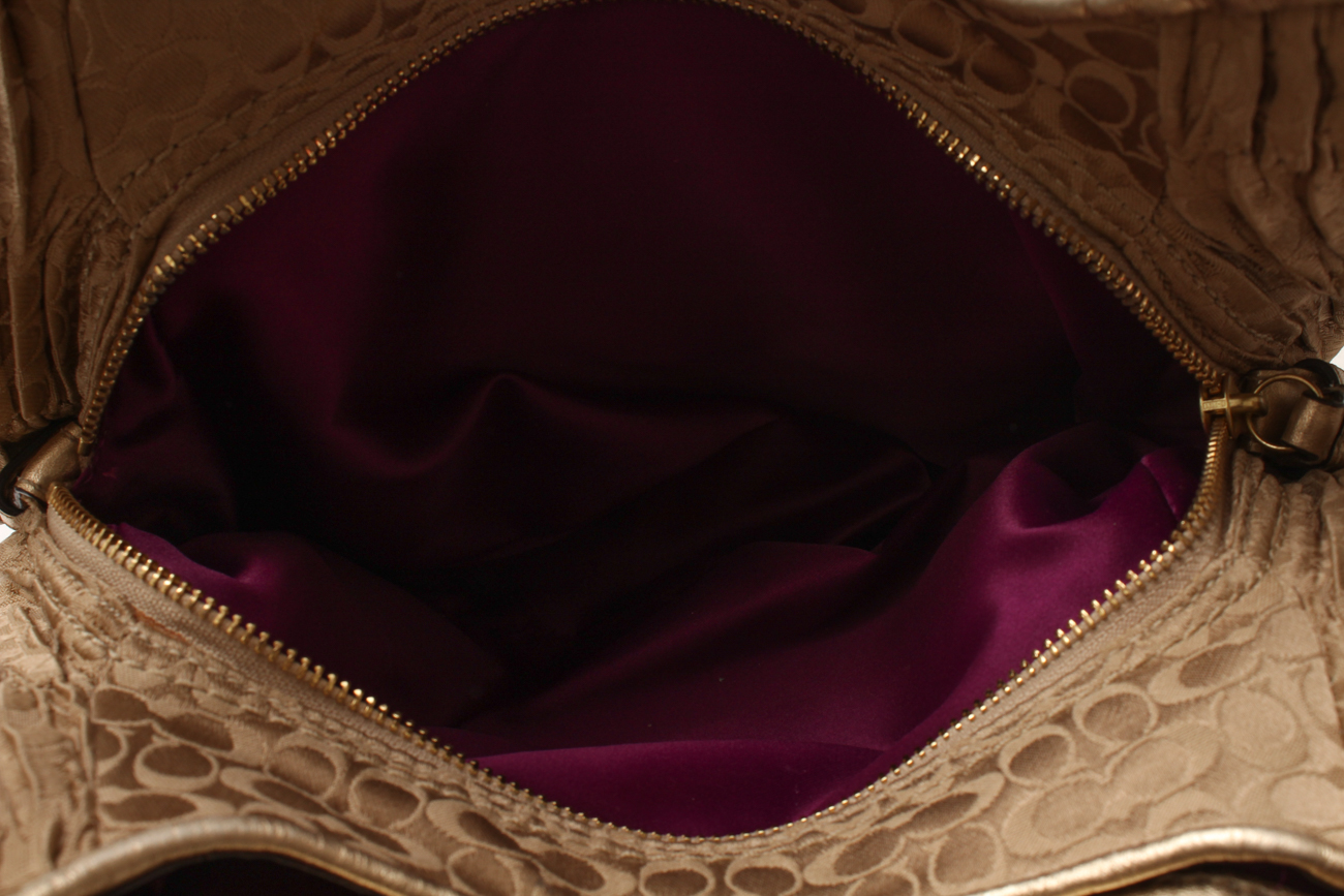 Coach Maggie Madison Signature Shoulder Bag and a Coach Metallic Duffle Bag