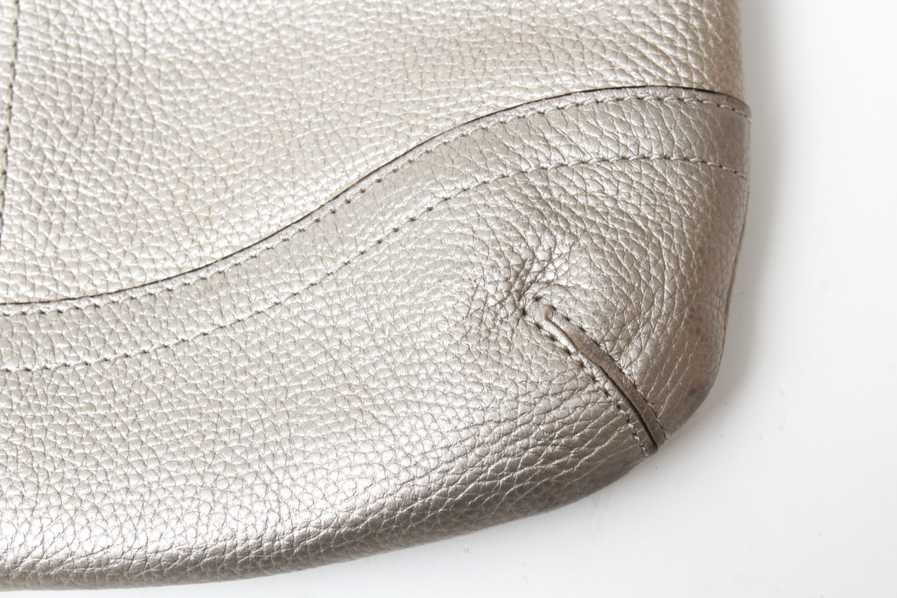 Coach Maggie Madison Signature Shoulder Bag and a Coach Metallic Duffle Bag