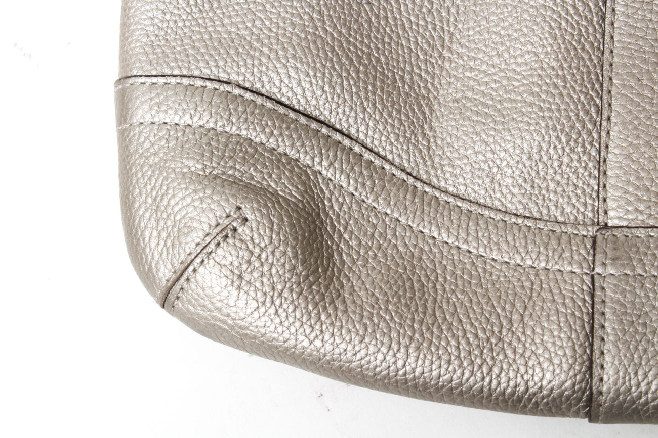 Coach Maggie Madison Signature Shoulder Bag and a Coach Metallic Duffle Bag