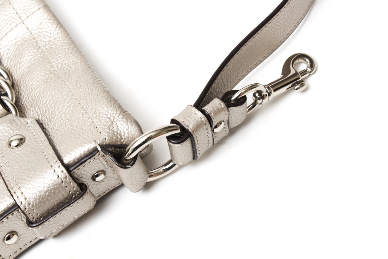 Coach Maggie Madison Signature Shoulder Bag and a Coach Metallic Duffle Bag