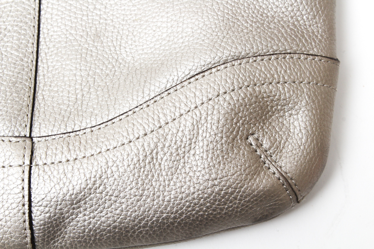 Coach Maggie Madison Signature Shoulder Bag and a Coach Metallic Duffle Bag