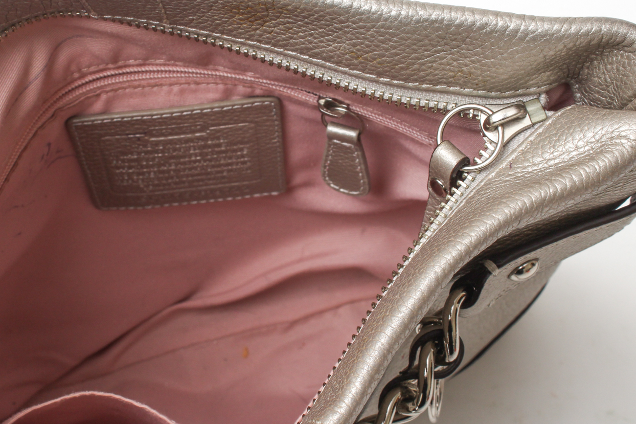 Coach Maggie Madison Signature Shoulder Bag and a Coach Metallic Duffle Bag