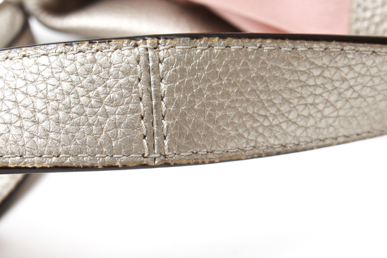 Coach Maggie Madison Signature Shoulder Bag and a Coach Metallic Duffle Bag