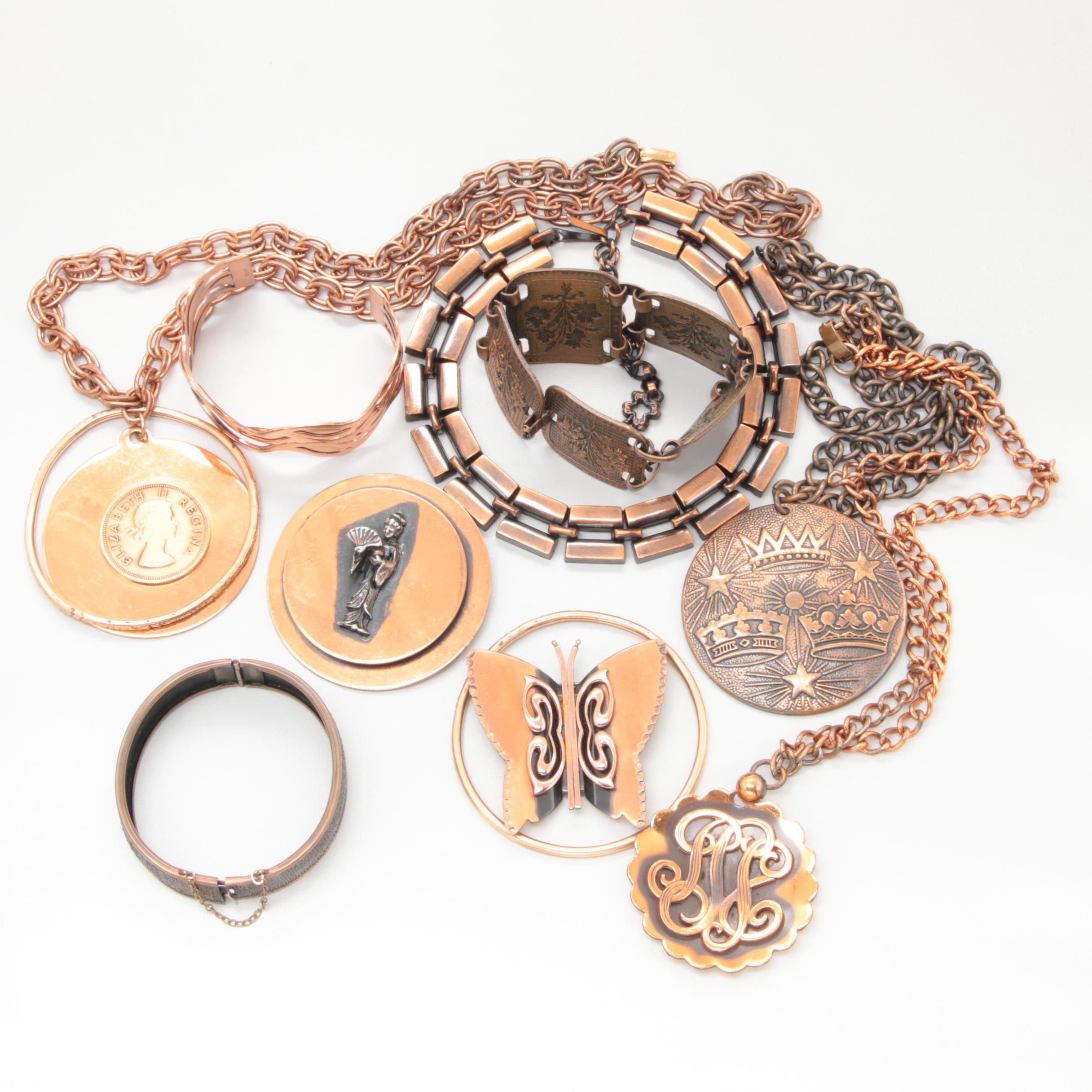Cooper Jewelry Assortment with a Butterfly Motif Brooch