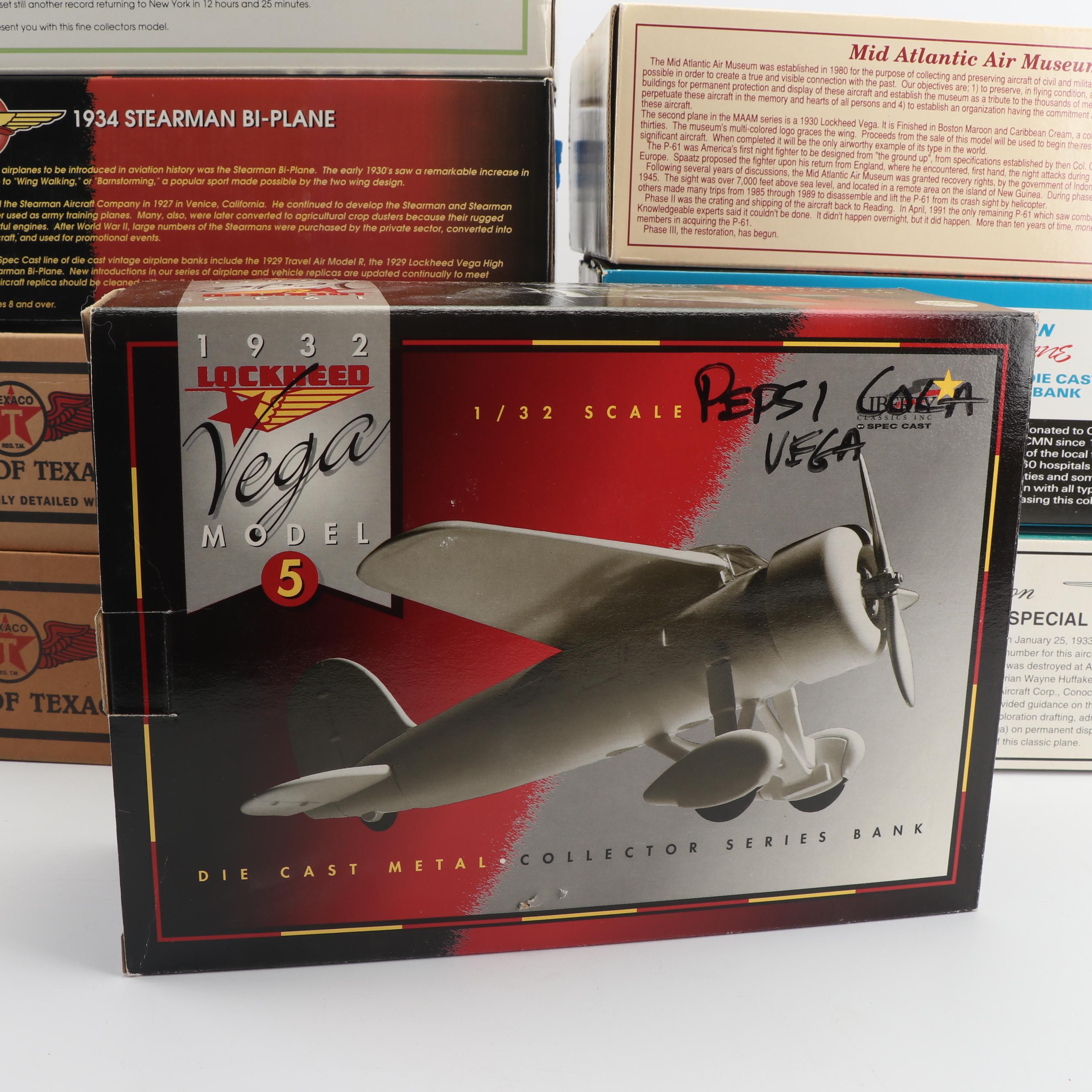 Die-Cast Airplane Coin Banks including Wings of Texaco