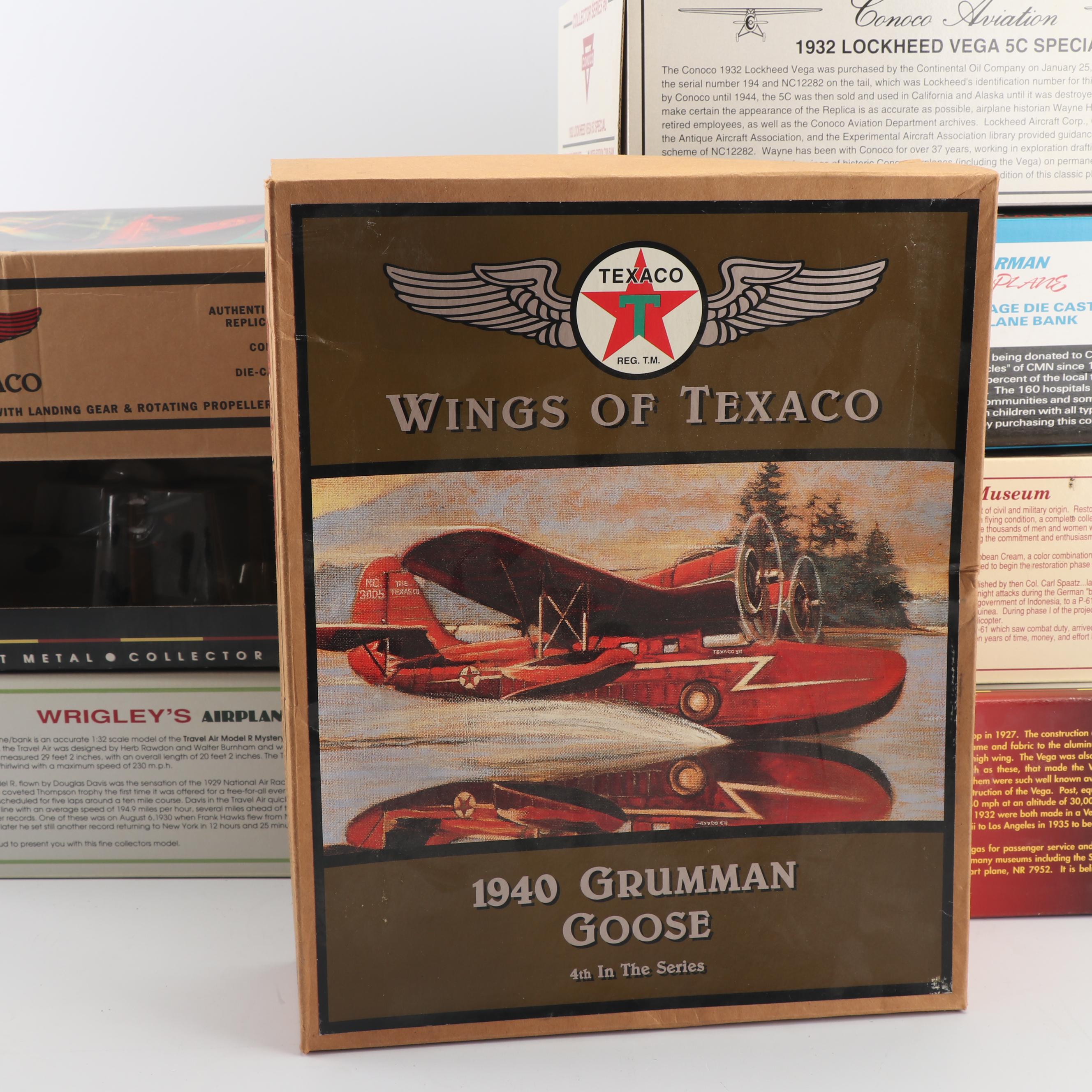 Die-Cast Airplane Coin Banks including Wings of Texaco