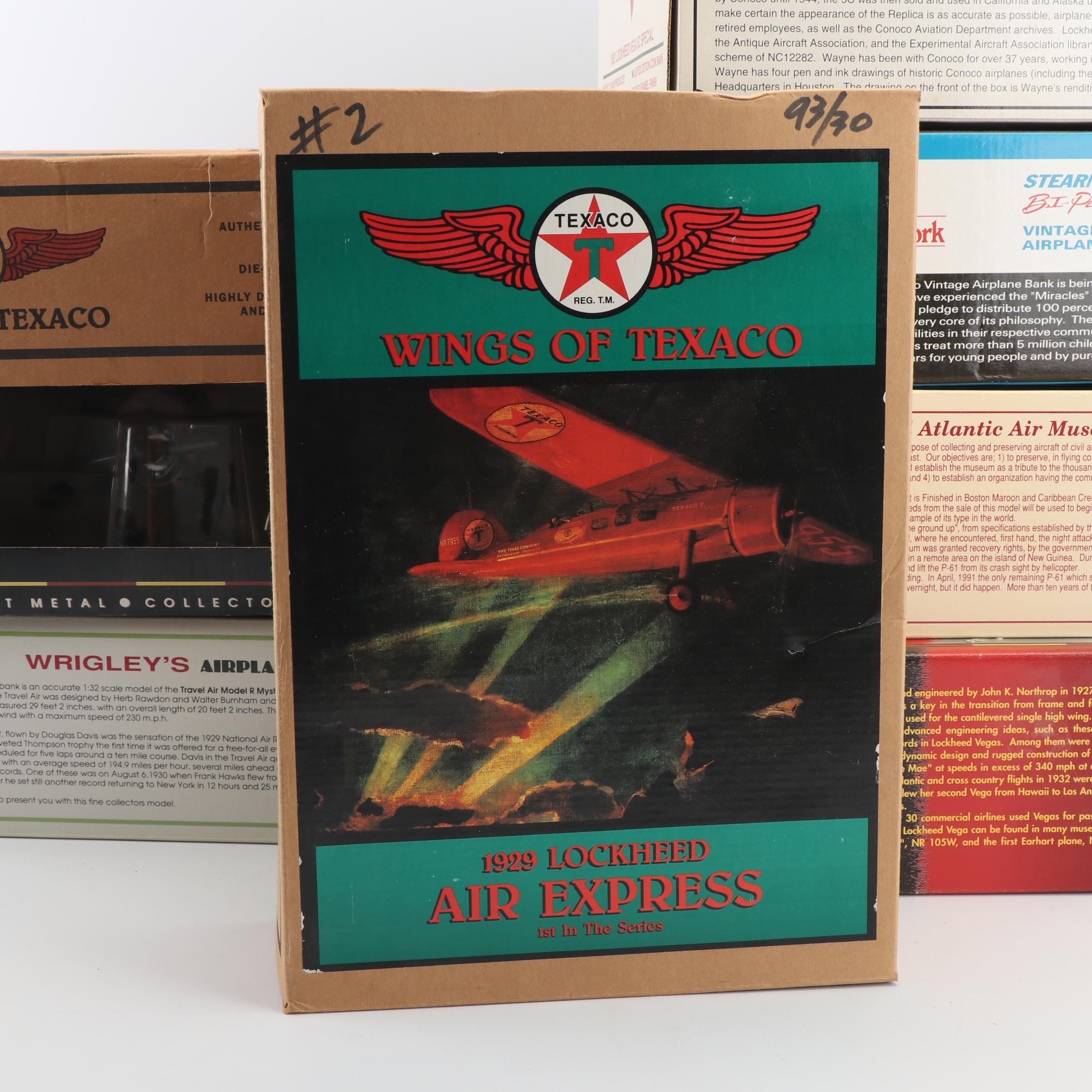 Die-Cast Airplane Coin Banks including Wings of Texaco