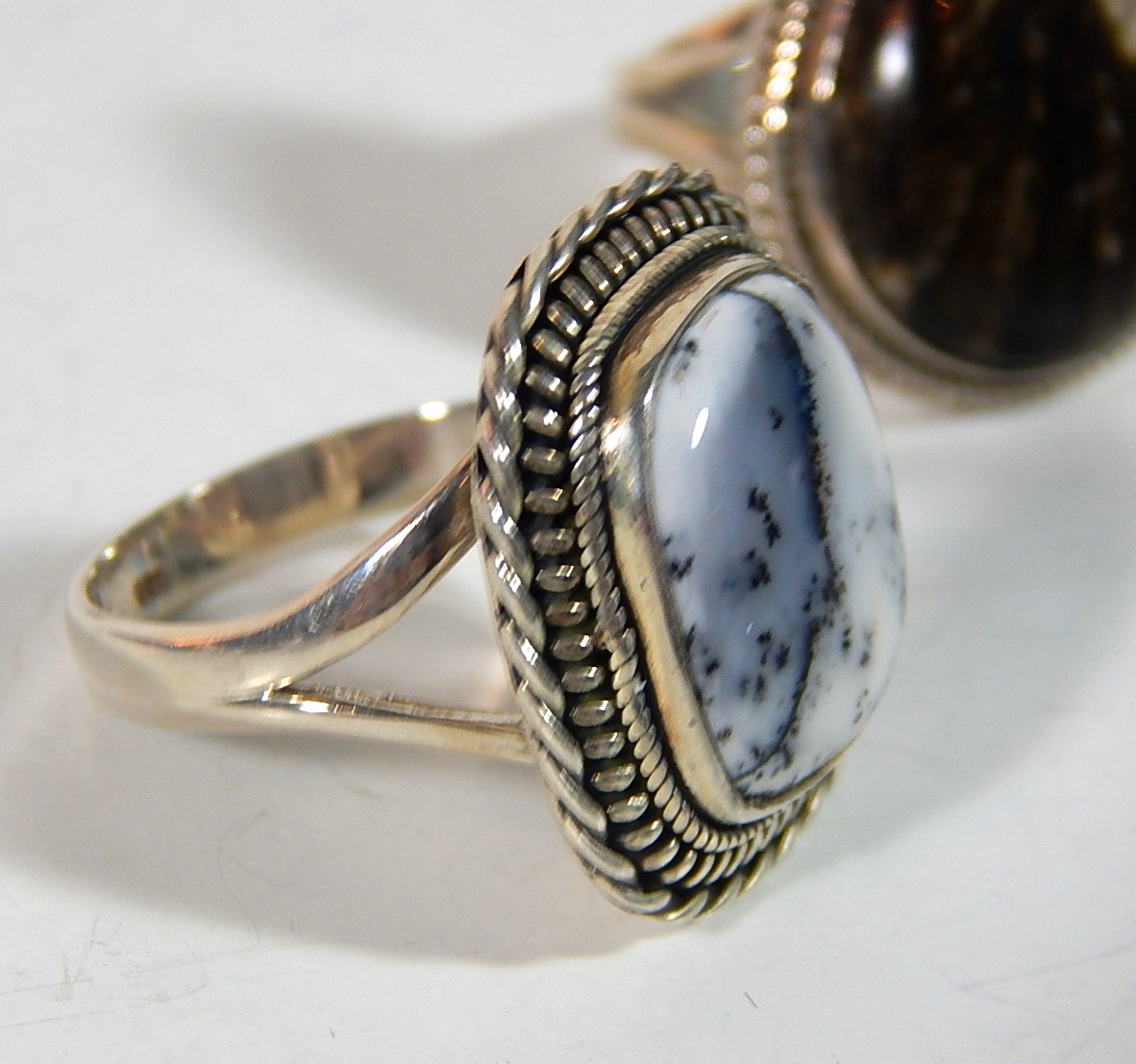 Two Sterling Silver Rings with Black Striated Square and Grey Pear Shaped