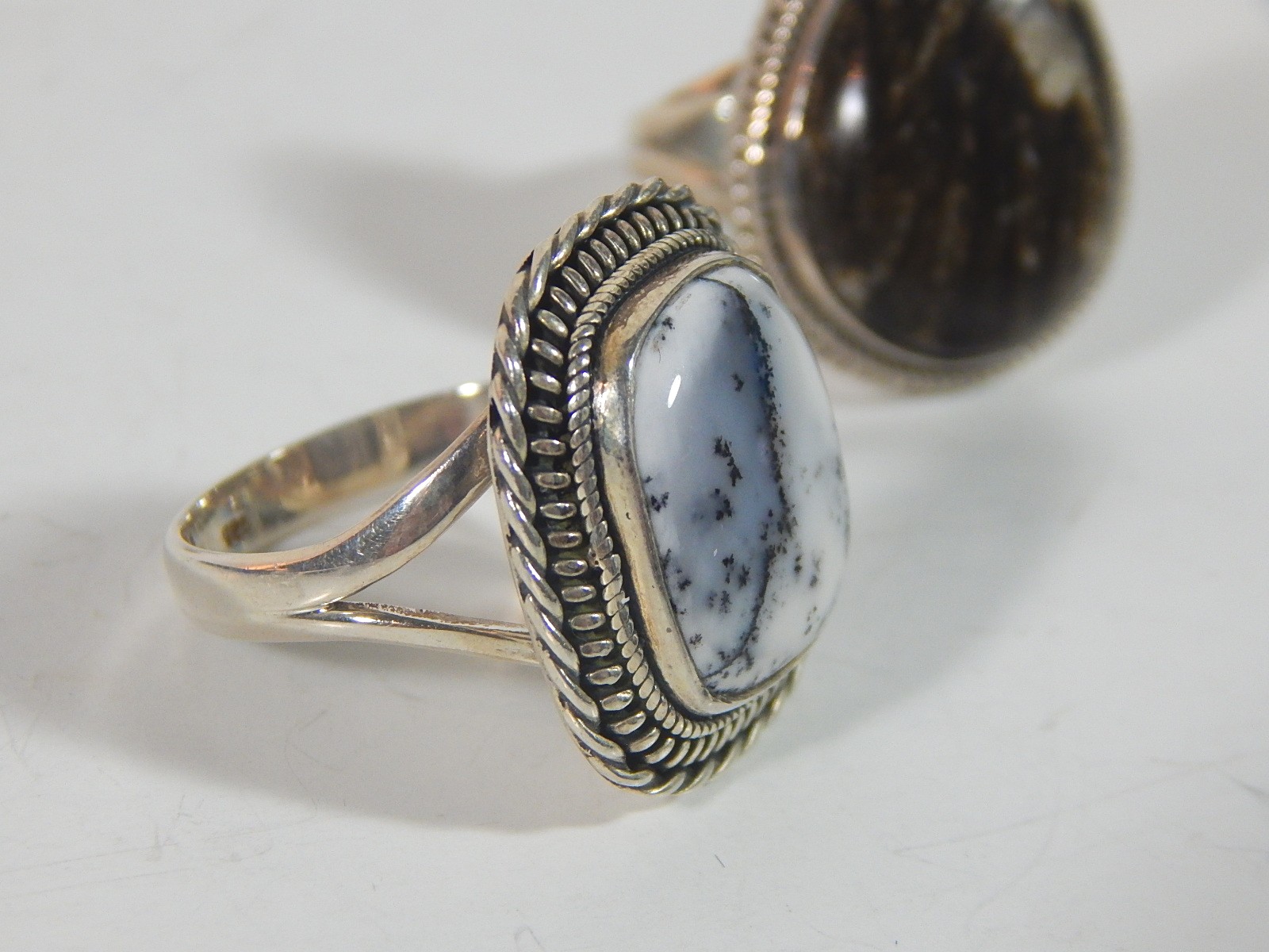 Two Sterling Silver Rings with Black Striated Square and Grey Pear Shaped