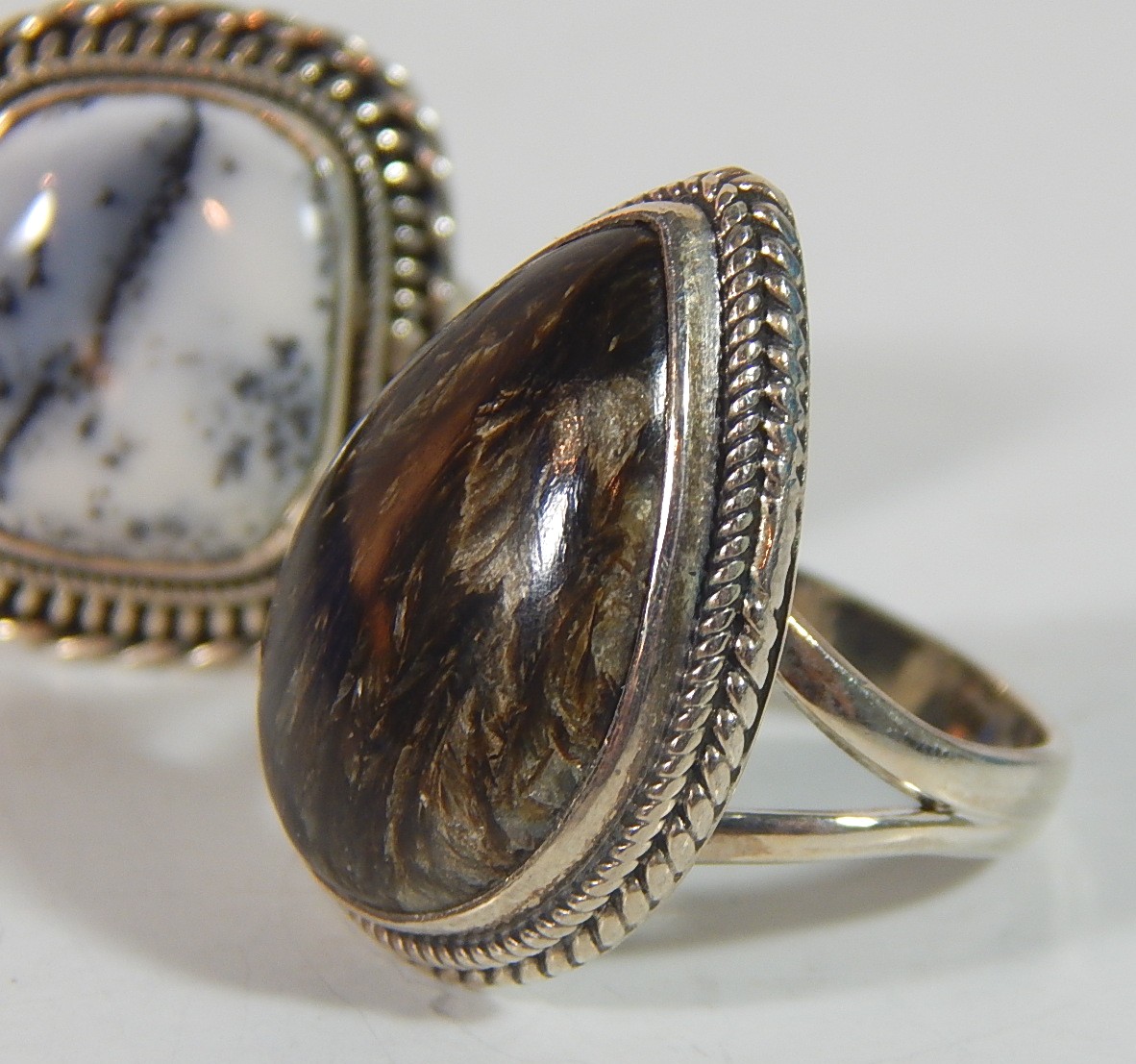 Two Sterling Silver Rings with Black Striated Square and Grey Pear Shaped
