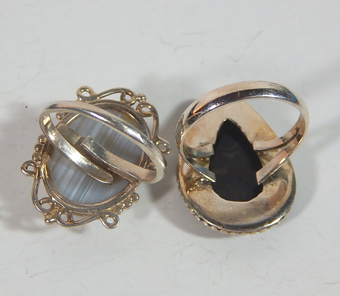 Two Sterling Silver Rings with Grey and White Striated, and Black Sculptured
