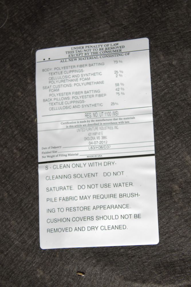 Brown Sueded Fabric Upholstered Loveseat by United Furniture Industries