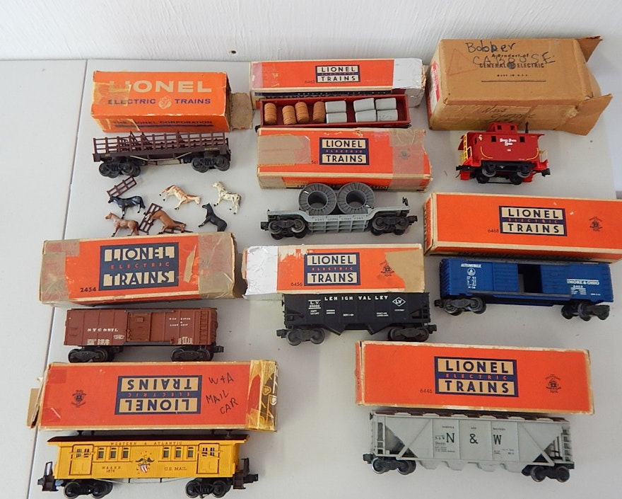 Nine Vintage Lionel O-Gauge Train Cars with Original Boxes