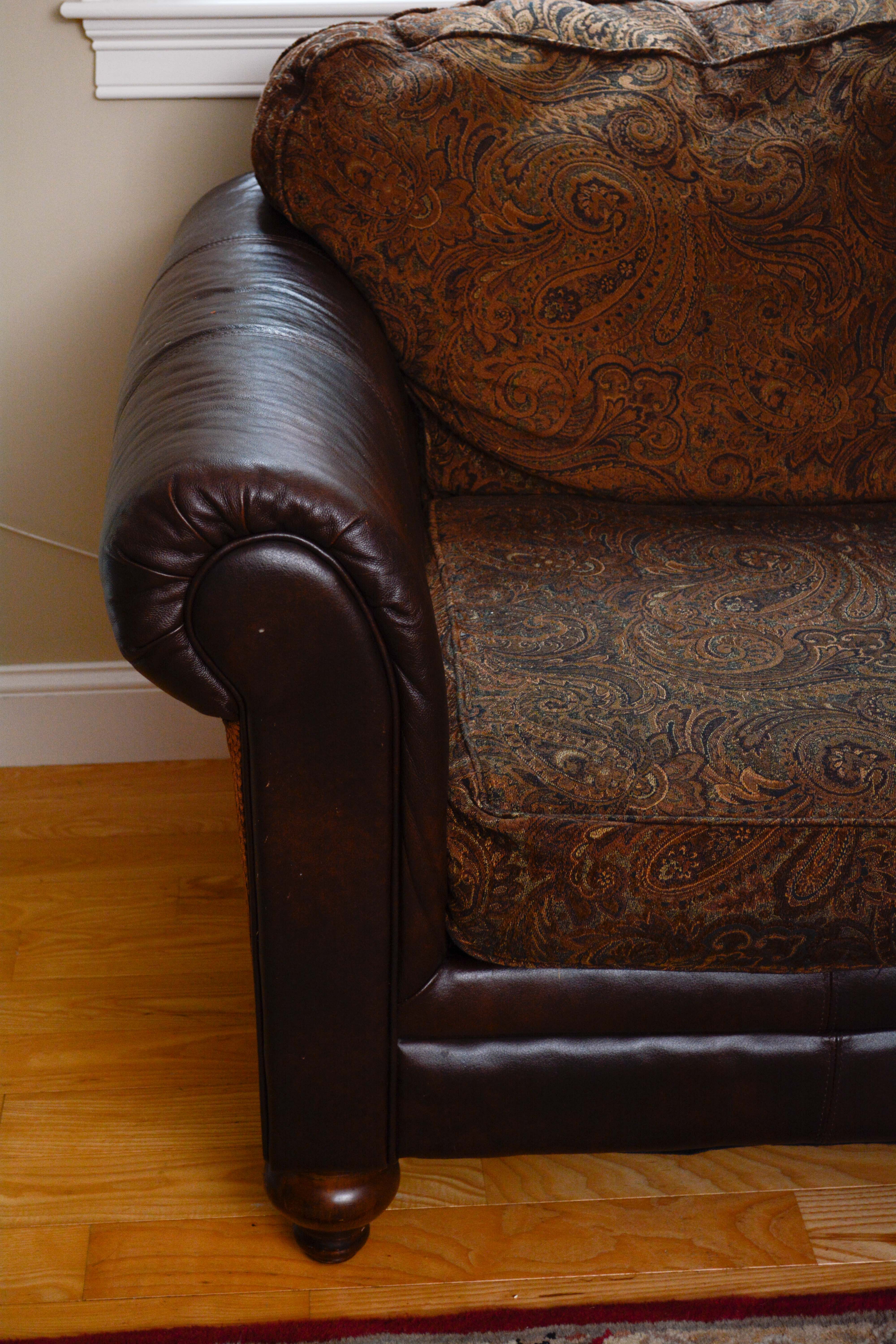 Leather and Paisley Loveseat by Ashley Home Furniture