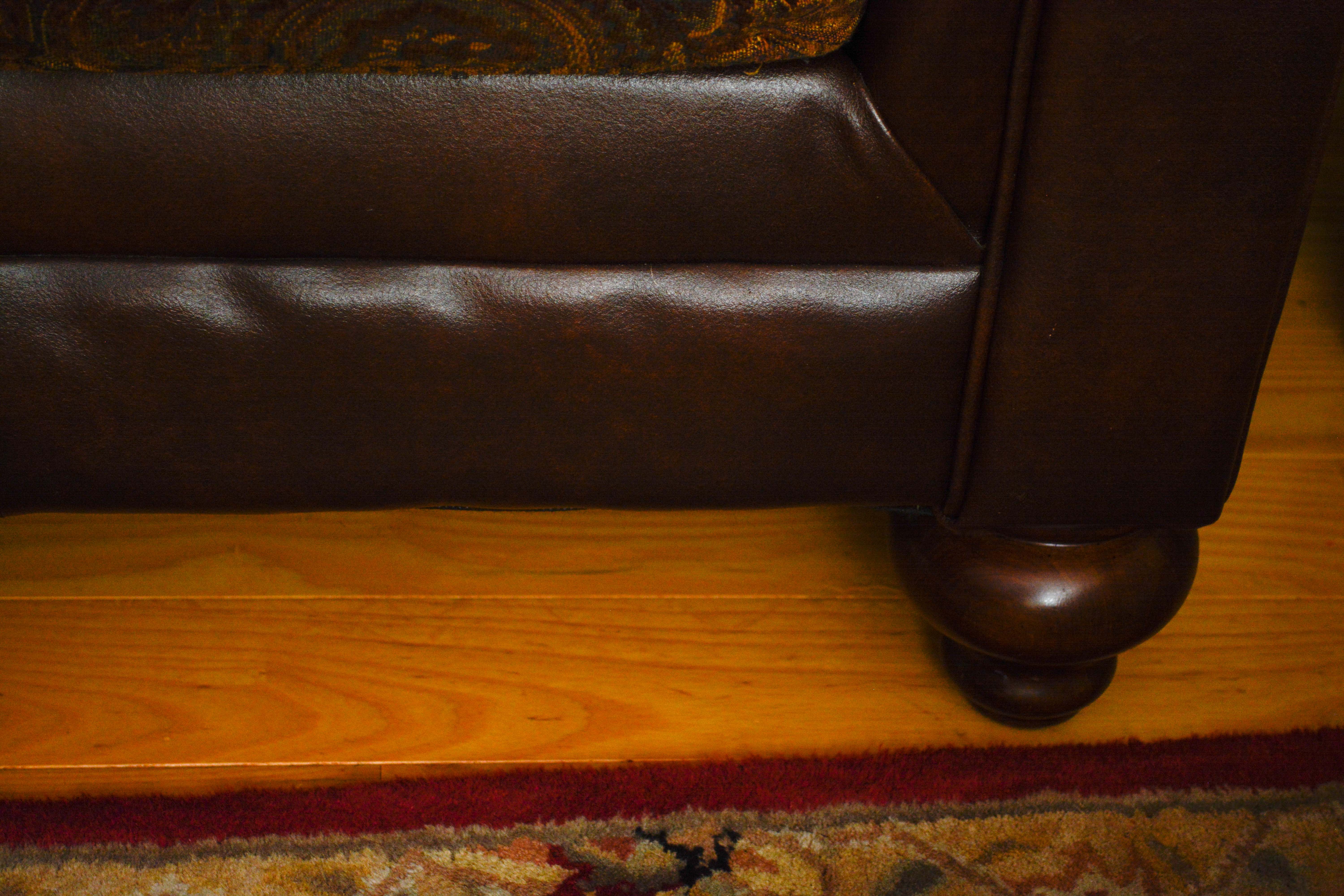 Leather and Paisley Loveseat by Ashley Home Furniture