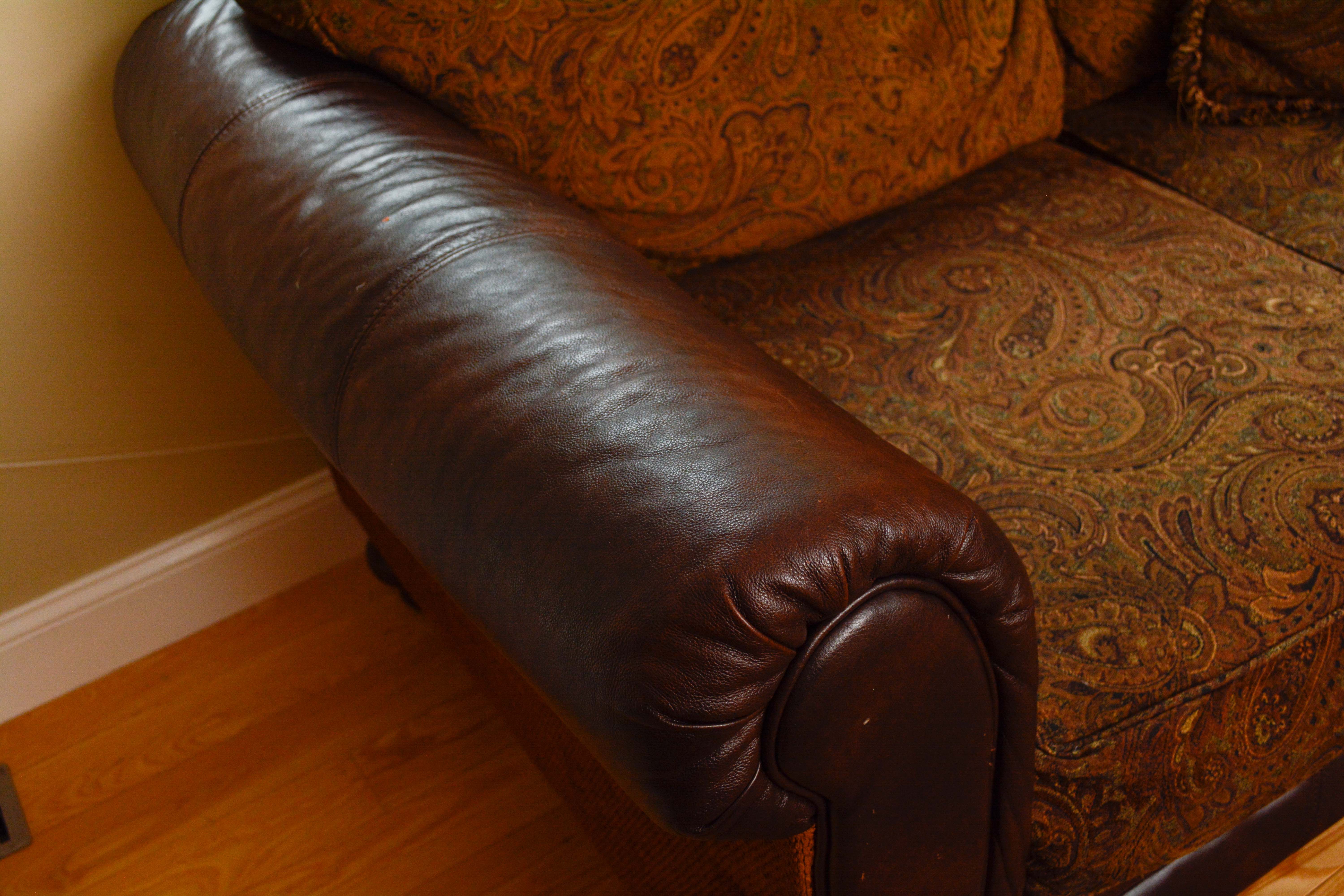 Leather and Paisley Loveseat by Ashley Home Furniture