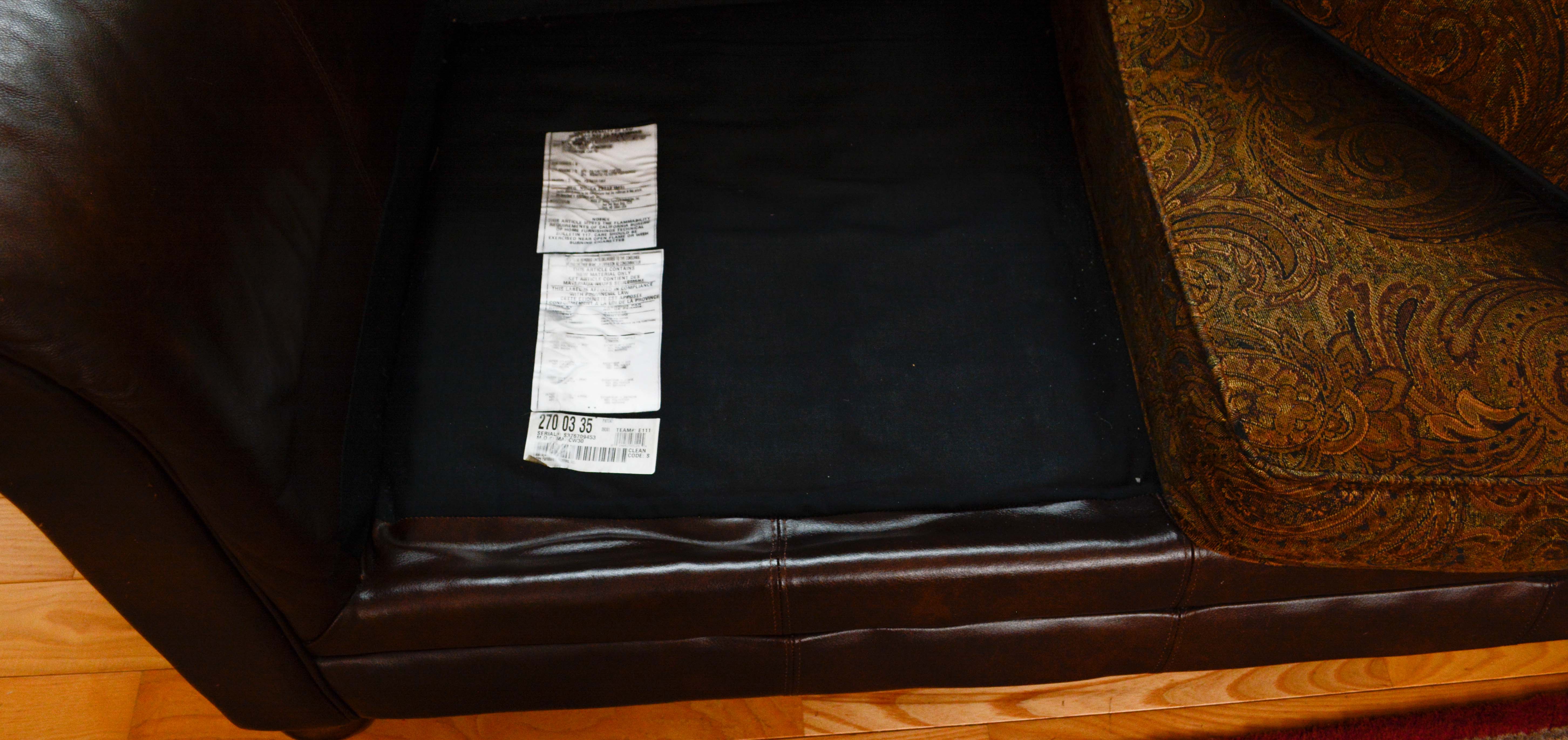 Leather and Paisley Loveseat by Ashley Home Furniture