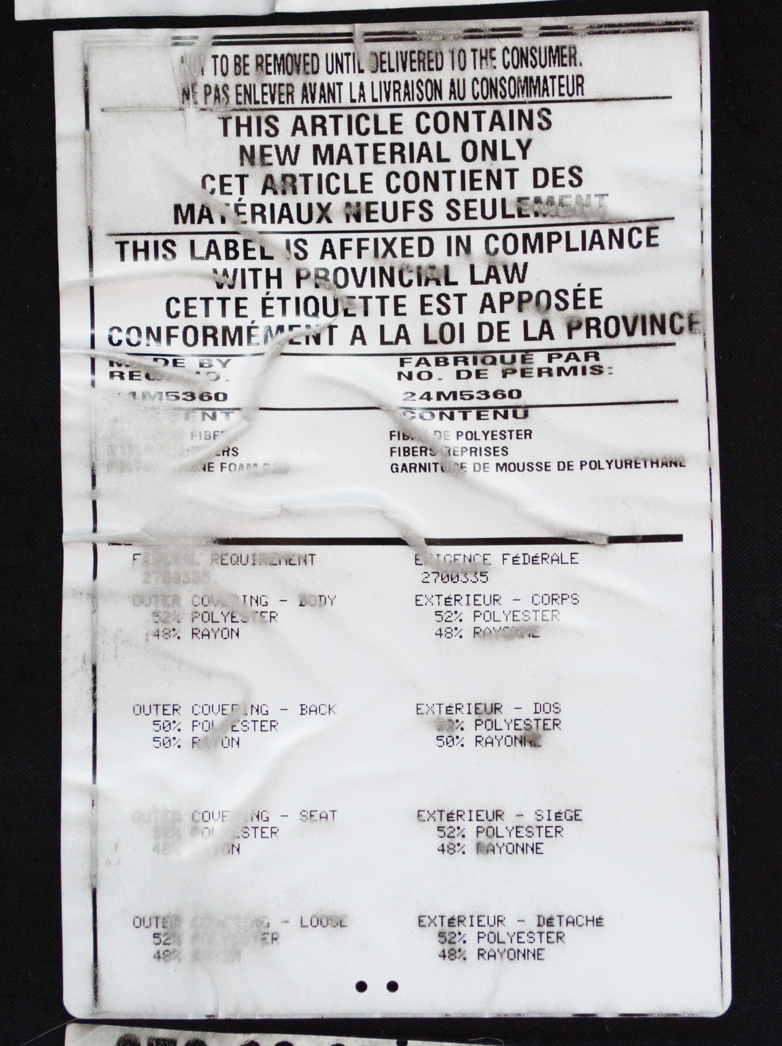 Leather and Paisley Loveseat by Ashley Home Furniture