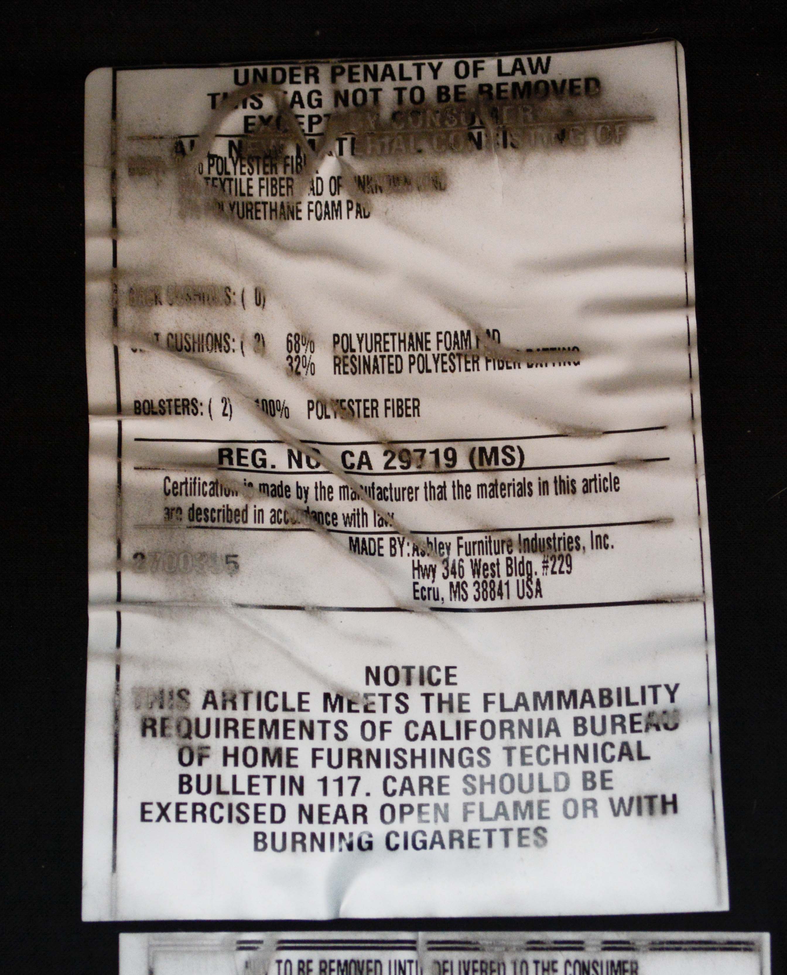 Leather and Paisley Loveseat by Ashley Home Furniture