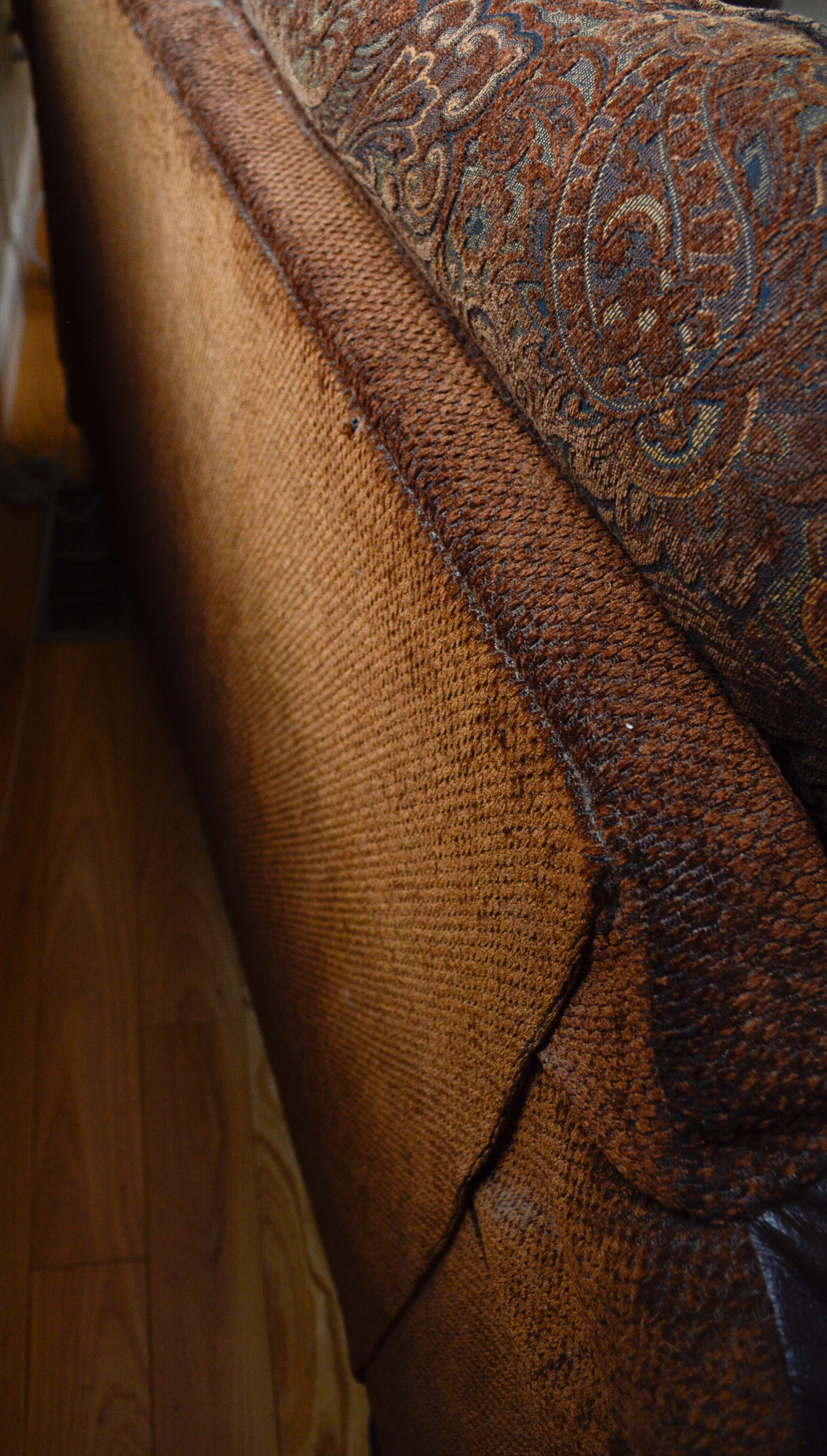 Leather and Paisley Loveseat by Ashley Home Furniture