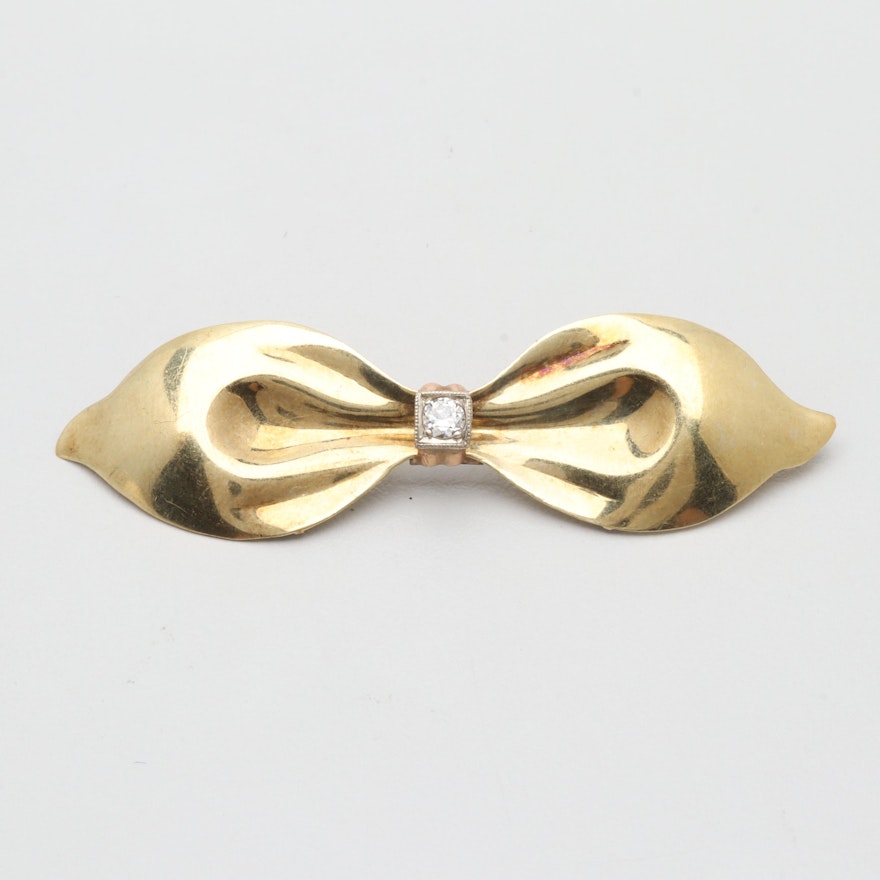 Circa 1940s 14K Yellow Gold Diamond Bow Brooch