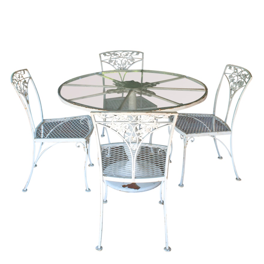 Glass Patio Table and Four Metal Patio Chairs