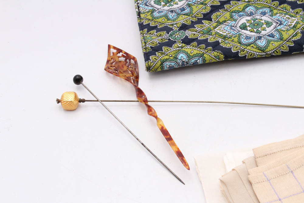 Women's Vintage Accessories Including Perfume Bottle, Hat Pins and Purses