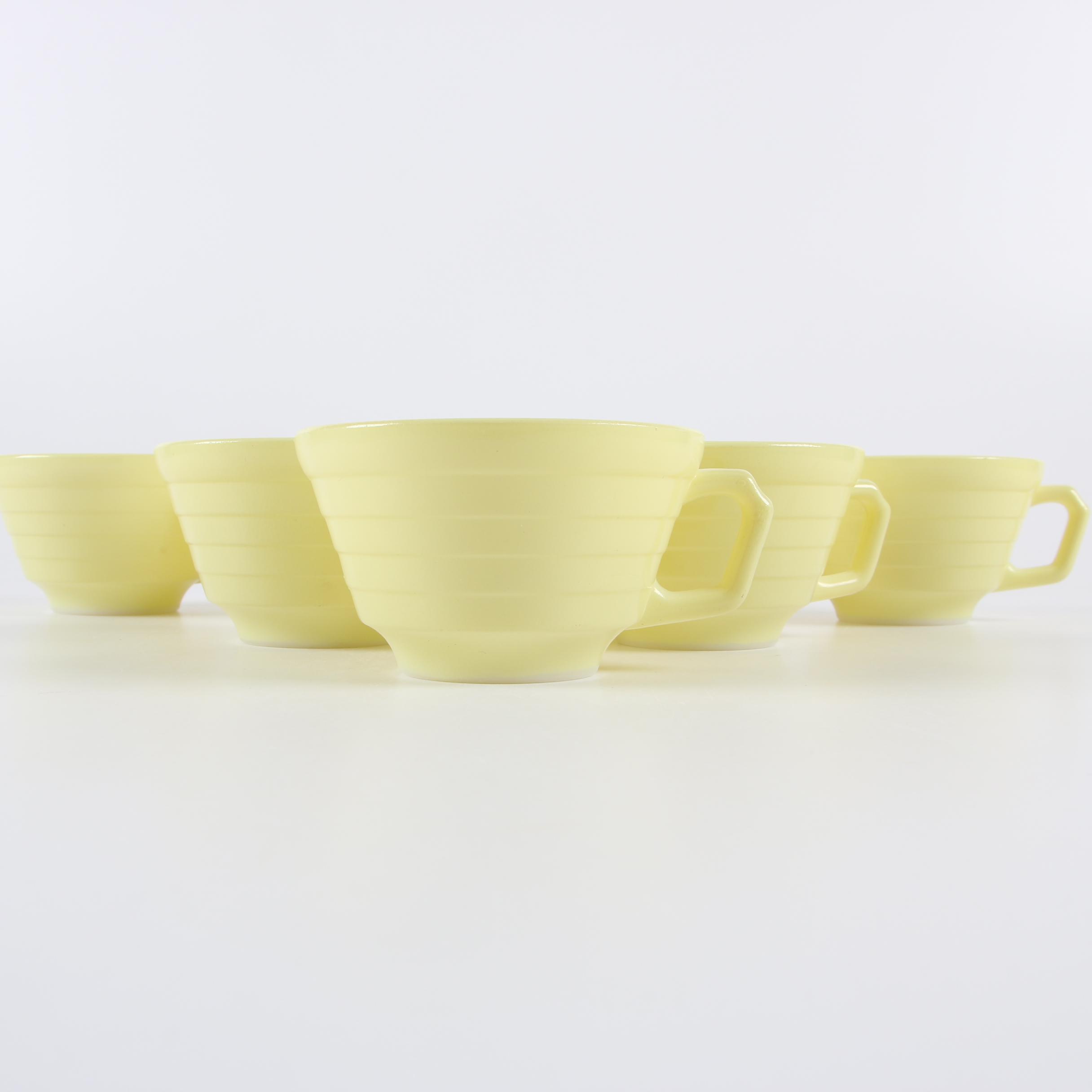 Vintage Fire-King Nesting Bowls with Jadeite and Yellow Glass Mugs